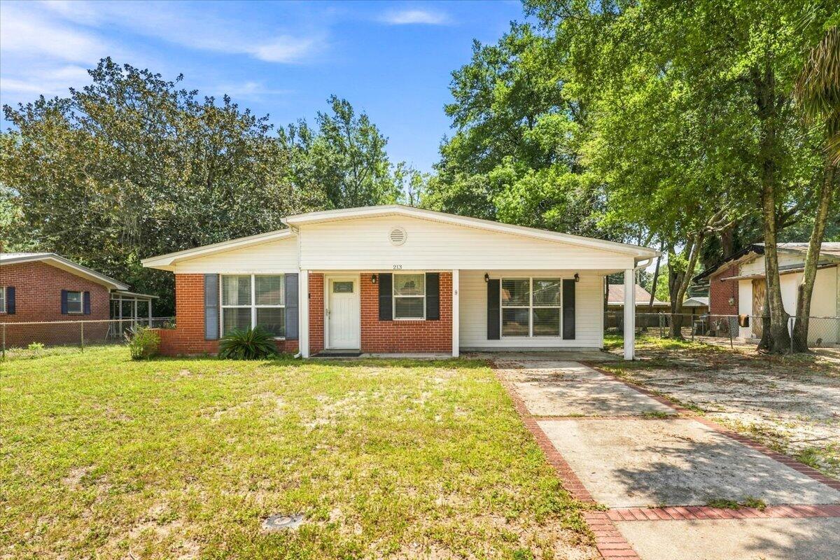 Welcome in to this charming and nicely appointed 2-bedroom, 2-bath home offering 1,464 square feet of comfortable living space in a convenient Fort Walton Beach location. Thoughtfully designed with an open layout and an abundance of features, this home offers the perfect blend of comfort, functionality, and character.

Step inside to a spacious front dining area that flows seamlessly into the well-appointed kitchen, featuring beautiful granite countertops, stainless appliances, recessed lighting, a slide-in gas range with overhead hood vent, and a large breakfast bar that opens to the spacious living room that provides plenty of space to relax and entertain, while a stylish sliding barn door leads to one of the home's standout features, a truly impressive laundry room. Or, you could create the front room into a formal living room, and place your dining area in the large living room in front of the large picture window. So many possibilities. 

You will love this oversized laundry room, it is a dream, offering an abundance of cabinetry, a pantry, full sized sink, and extensive counter space for storage, organization, hobbies, or everyday convenience. The washer and dryer are included. Adding even more efficiency, the home also features a tankless gas water heater.

The spacious master bedroom offers a wonderful retreat with a large, open master bath featuring two separate vanities, a private toilet closet, and a shower. A door from the primary suite provides direct access to t he screened-in back porch, creating a peaceful spot to enjoy your morning coffee or unwind in the evening.

The additional bedroom is conveniently located near the guest bath, which features a pedestal sink, shelving, and tub/shower combination. Tile flooring extends through the kitchen, dining area, hallway, both bathrooms, and laundry room, while the bedrooms feature comfortable laminate and lvp flooring.

Outside, you'll find a nicely sized fenced backyard with a sprinkler system and lawn pump, plus a convenient storage shed providing plenty of room for tools, lawn equipment, and all those extras you don't want taking up space inside. The backyard is shady and spacious, with plenty of room for a pool, if you so desire to add one. 

Important updates include a 2015 roof, 2019 HVAC system, and tankless gas water heater.

Location is another major advantage. You'll be conveniently situated near both Eglin Air Force Base and Hurlburt Field, with Publix and a variety of popular lunch and dinner spots just a few blocks down the road. A sidewalk runs along the length of Newcastle Drive, making the neighborhood especially convenient for walking and enjoying the surrounding area.

With its inviting open floor plan, spacious rooms, exceptional laundry room, screened porch, fenced yard, and convenient location, 213 Newcastle Drive is a home you'll want to see in person! All data is deemed to be accurate. Interested buyer's should verify any and all information, dimensions, and items important to buyer. Home is offered AS IS.