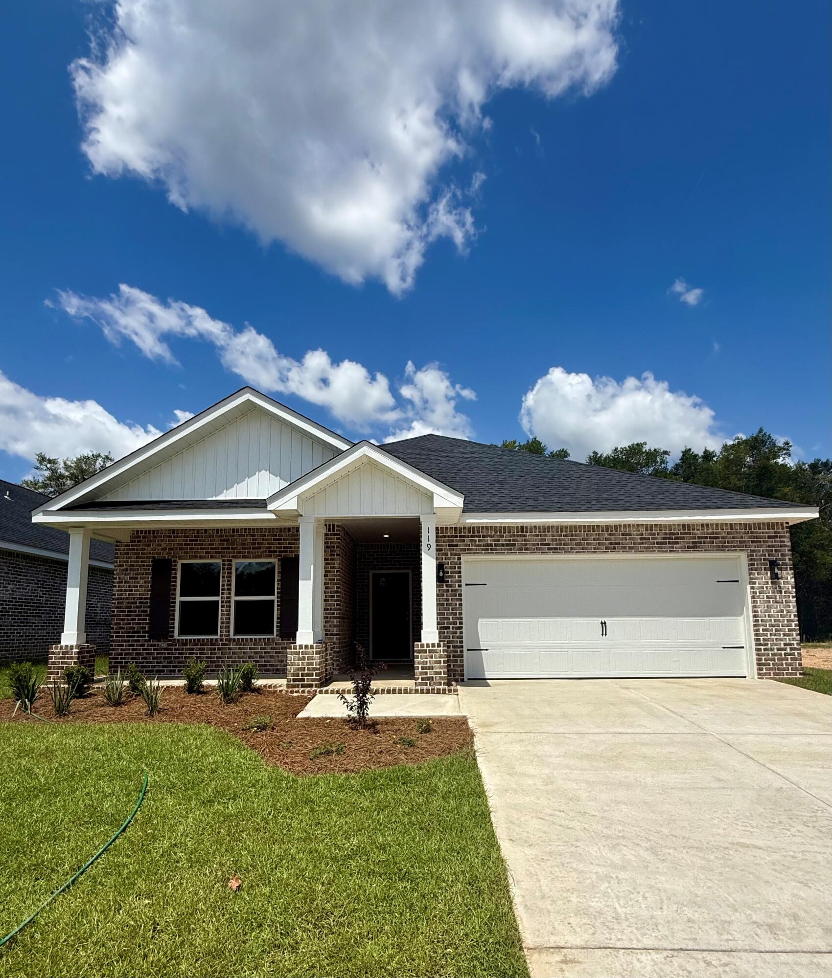 ALL BRICK AND A NOTICEABLE CUT ABOVE can be seen throughout this ''Maybell III'' floor plan. - So conveniently located across from Walton High School in McCarthy Estates!  All brick construction, fully landscaped yards, finished garage, front & rear porches.  Open floor plan featuring raised ceilings, recessed lighting and plenty of windows for natural light.  Family gathering space overlooks kitchen & cozy dining nook.  Kitchen work island w/bar seating, corner pantry, quartz countertops and white shaker cabinets.  Owner's bath has double vanities, walk-in closet + linen storage, shower only.  Luxury vinyl plank flooring in common areas, carpet in bedrooms.  Seller may contribute up to $10,000 towards buyers closing costs/prepaids/rate buydown. READY IN JULY.