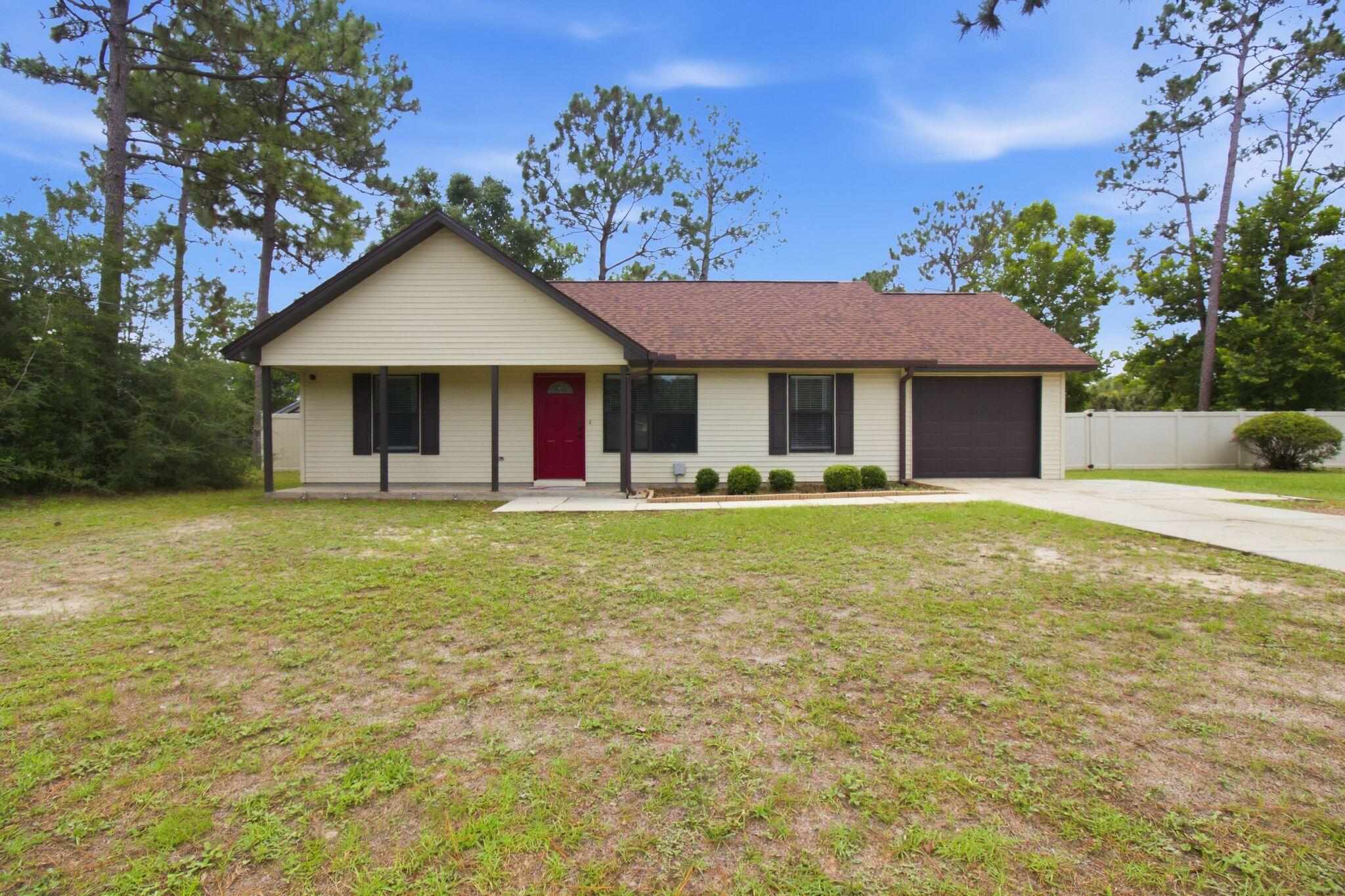 Available Now! This beautifully maintained 3-bedroom, 2-bath home offers the perfect combination of comfort, privacy, and convenience. Situated on an almost half-acre corner lot in South Crestview (NO  HOA), you'll enjoy plenty of outdoor space while being just minutes from Duke Field, 7th Special Forces Group, and I-10.

Inside, the thoughtfully designed split-bedroom floor plan provides privacy for the primary suite while the spacious living room welcomes you with soaring vaulted ceilings accented by beautiful exposed beams. The primary bedroom also features matching vaulted, beamed ceilings, creating a bright and inviting retreat.

The galley-style kitchen offers ample cabinet and counter space, a generous walk-in pantry, and a window over the kitchen sink overlooking the fully fenced backyard--perfect for keeping an eye on outdoor activities while preparing meals.

Step through the dining area onto the open patio, an ideal spot for grilling, entertaining, or simply enjoying your morning coffee. The backyard is enclosed by an attractive 8-foot white vinyl privacy fence and includes a large detached workshop complete with electricity, making it perfect for hobbies, storage, or a home workshop. A one-car garage provides additional storage and convenience.

If you've been looking for a home with extra outdoor space, a functional floor plan, and an unbeatable South Crestview location, this property deserves a spot at the top of your list! No smoking or vaping is permitted. Pets may be considered with owner approval, applicable restrictions, and a non-refundable $400 pet fee. Additional monthly fees may apply, including a Landlord Liability Policy (if proof of renter's insurance is not provided) and Pest Assurance. Visit RentwithBSR.com for complete rental criteria, fees, and application requirements or call 850-729-0399 for more information.