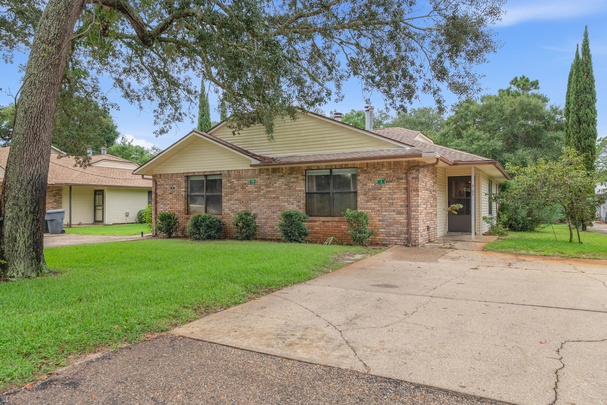Attention investors! Duplex investment opportunity in the heart of Fort Walton Beach! Step right into a cash flowing investment property, offering an exceptional ROI for investors looking to expand their rental portfolio. 8.5% Gross Cap Rate! The best part, if you are looking for one more duplex, the sister property, 512 Parkview Rd is also for sale next door, if you want to add another 2 units to your rental portfolio! Each unit features a comfortable 2-bedroom, 2-bathroom layout, providing ample living space and strong appeal for long-term tenants. Both Units are currently occupied with two long term leases at $1,600/month, renewing Spring of 2027. 
The functional floor plans offer spacious living areas with beautiful brick, wood burning fireplaces, recently updated kitchens, private bedrooms, and two full bathrooms per unit. Two separate residences under one roof. Conveniently located near local shopping, dining, schools, military installations, entertainment, and the beautiful Emerald Coast beaches, this property puts residents close to everything Fort Walton Beach has to offer. Whether you're an experienced investor or newer, this duplex offers versatility, location, and income-producing returns in a highly desirable Northwest Florida market. New roof to be installed in Sept. 2026. 
These rarely come to the market. Don't miss your chance to own a great income producing asset.