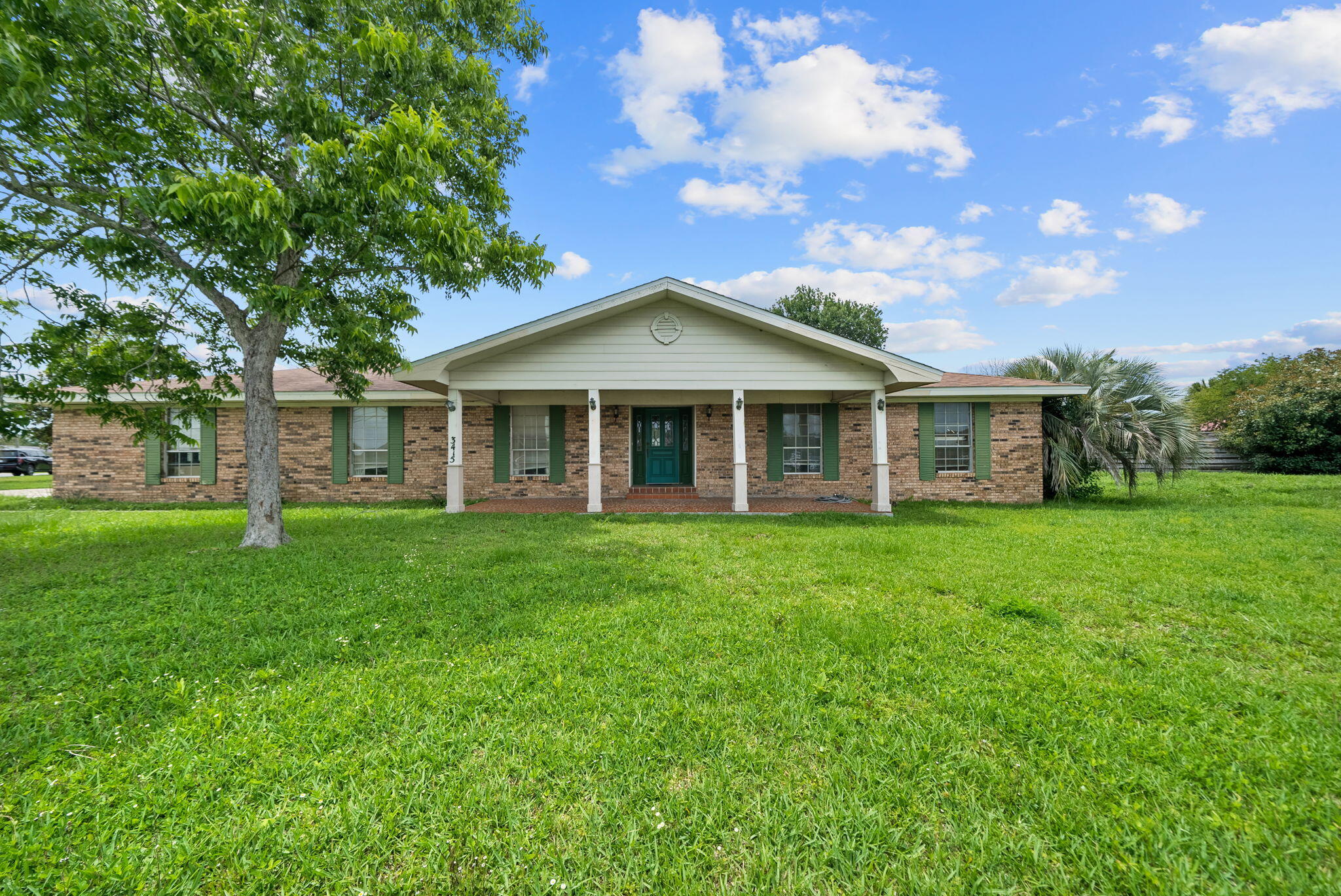 This home offers a rare opportunity to build your own equity in the center of town. The potential is incredible and it's waiting for someone with vision to bring it back to life. 

With NO HOA, this one has endless possibilities. Sitting proudly on a corner lot, this 2,540-square-foot home is a canvas waiting for vision. With four bedrooms, two and a half baths, two distinct living areas-one with vaulted beamed ceilings, a mother-in-law suite, and a carport, the bones are unmistakably generous. And in today's market, this type of square footage is hard to come by. 

The mother-in-law suite with it's own entrance, alone opens the door to a world of possibilities: multi-generational living, a long-term rental income stream, or a private guest retreat that makes every out-of-town visitor feel at home. Dual living areas give this floor plan a flexibility that newer builds simply can't replicate. Whether you're envisioning a formal sitting room paired with a casual family space, or a home office and entertainment hub, the layout works for the life you want to live. 

Looking for investment? This is it! Build your own equity and flip for maximum cash in your pocket right now or renovate, rent and hold it for a long term play on your investment portfolio. Rentals over 2,500 square feet with 4 bedrooms are in high demand in this area of town. The location is almost impossible to beat. You're moments from two Publix grocery stores, surrounded by convenient shopping and dining on 23rd Street and the master-planned community Sweet Bay, and within excellent proximity for schools that consistently earn top accolades. 

This is the kind of address that families actively seek out and are willing to pay a premium for once the right finishes are in place. 

Bring your contractor and bring your vision, because the investor who moves quickly on this one will be the investor who gets to write the story of what happens next. Post-renovation, a home of this size, suite configuration, and central Panama City location has the makings of serious equity. This is the kind that rewards those who saw the diamond in the rough! This home is being sold AS-IS.