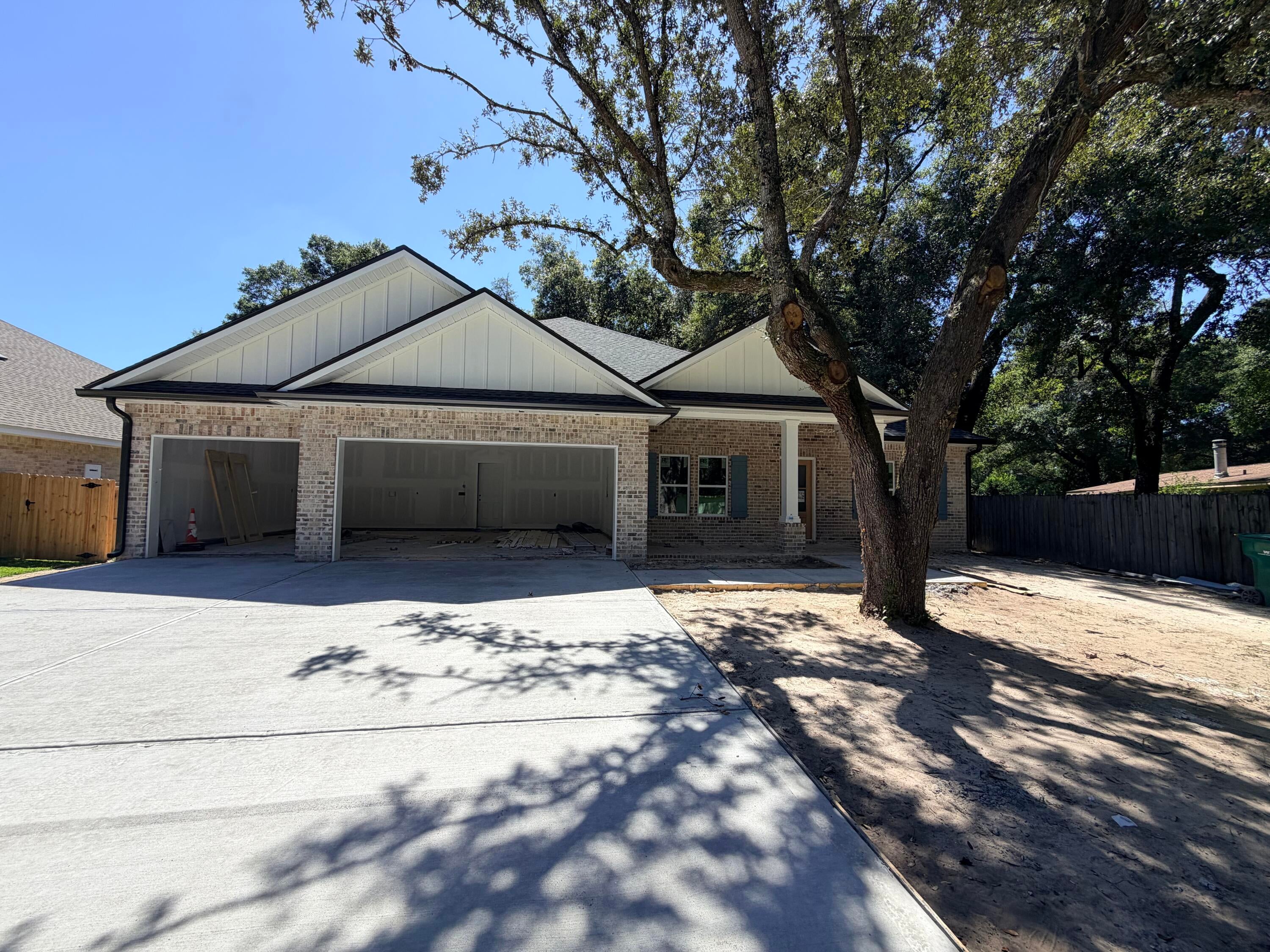 *Estimated Completion Date of October 30th.* This stunning brand-new Craftsman-style residence in the heart of Niceville offers a rare combination of modern luxury and turn-key convenience. Photos are of a similar floor plan. Finishes & some details depicted may not be the same. Boasting five spacious bedrooms and three full bathrooms across a thoughtfully designed 2,656-square-foot layout, this home is engineered for both sophisticated entertaining and comfortable daily living. The heart of the home is a chef-inspired kitchen featuring premium quartz countertops, a professional gas range, custom soft-close cabinetry, and a deep farmhouse sink, all centered around a functional island and a massive walk-in pantry. High-end luxury vinyl plank flooring flows seamlessly through the main living areas, accented by elegant crown molding and soaring vaulted and tray ceilings that enhance the home's open, airy feel. The split-bedroom floor plan ensures maximum privacy for the primary suite, which serves as a true retreat with its spa-like garden tub and dual-vanity bath. Efficiency and safety are paramount, with the inclusion of a tankless gas water heater, natural gas heating, impact-rated windows, and a full sprinkler system. Outside, the oversized three-car garage provides ample space for vehicles, a boat, or a workshop, while the level backyard offers a secure oasis for relaxation. Situated in the top-rated Plew, Ruckel, and Niceville High school districts, this home is just minutes from Eglin AFB and the white-sand beaches of the Emerald Coast.
*Fence, blinds, and fridge included with acceptable offer and must be included in additional terms.*Builder incentives MUST be included in contract*