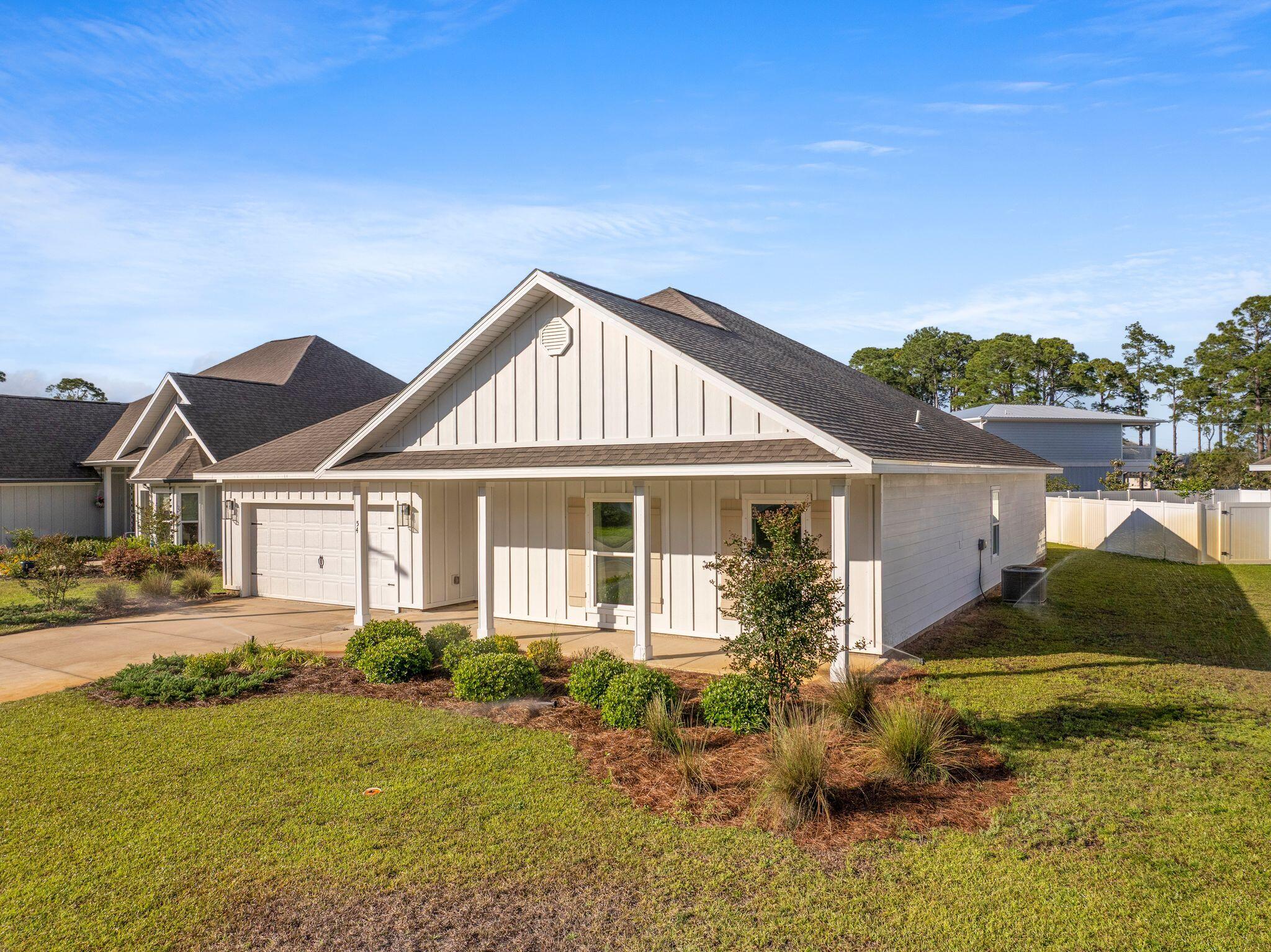 Beautifully upgraded home in Santa Rosa Beach offering a refined coastal feel with designer finishes throughout. This never-lived-in residence features upgraded appliances, an enhanced stove, farmhouse sink, built-in trash system, and a premium drinking water system with Kinetico filtration. Mosaic tile accents elevate the kitchen and bathrooms, complemented by Pottery Barn-inspired lighting and vanities. Enjoy full smart home and security integration for modern convenience. Exterior highlights include a well water source, fertilizer system, anti-rust irrigation, and additional sprinkler zones. A turnkey opportunity combining style, efficiency, and thoughtful upgrades throughout.