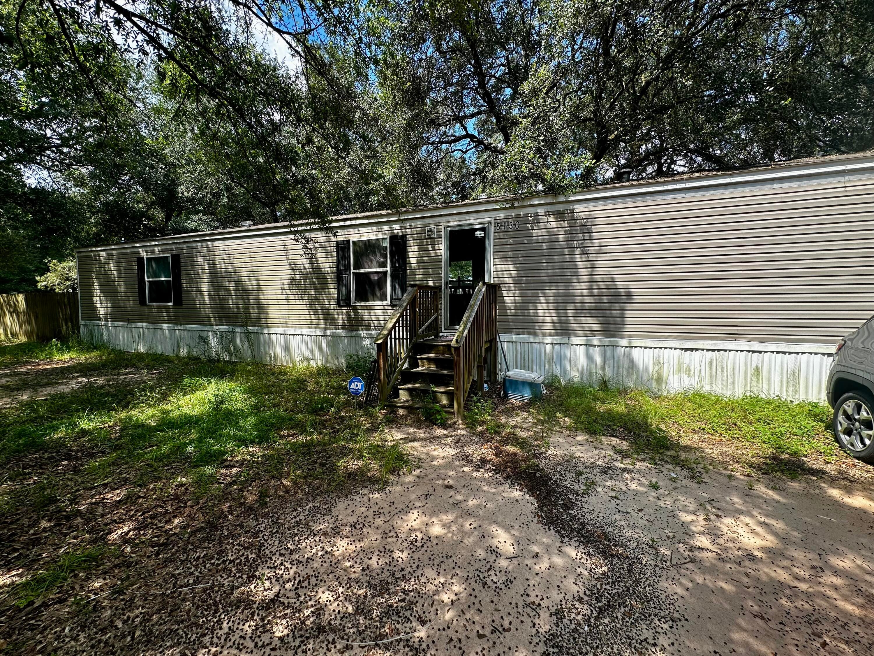 Opportunity knocks on this fully fenced 0.5 +/-acre corner lot! Prime for an investor, flipper, or buyer looking to build sweat equity, this property offers an exceptional canvas with plenty of room to stretch out and realize its true potential.

The sprawling backyard features an extra power pole, creating a great setup for a future workshop or custom outdoor retreat. Inside, you'll find a popular open-concept layout featuring split bedrooms, generous closet storage, and a primary suite with a garden tub and separate 5-foot shower.

While the home needs some TLC and personal touches to bring it back to its full shine, the value of this corner lot and layout is hard to match. More photos coming soon! Whether you're adding to your rental portfolio or crafting a customized home on a great piece of land, the possibilities here are endless. Schedule your showing today and bring your vision!