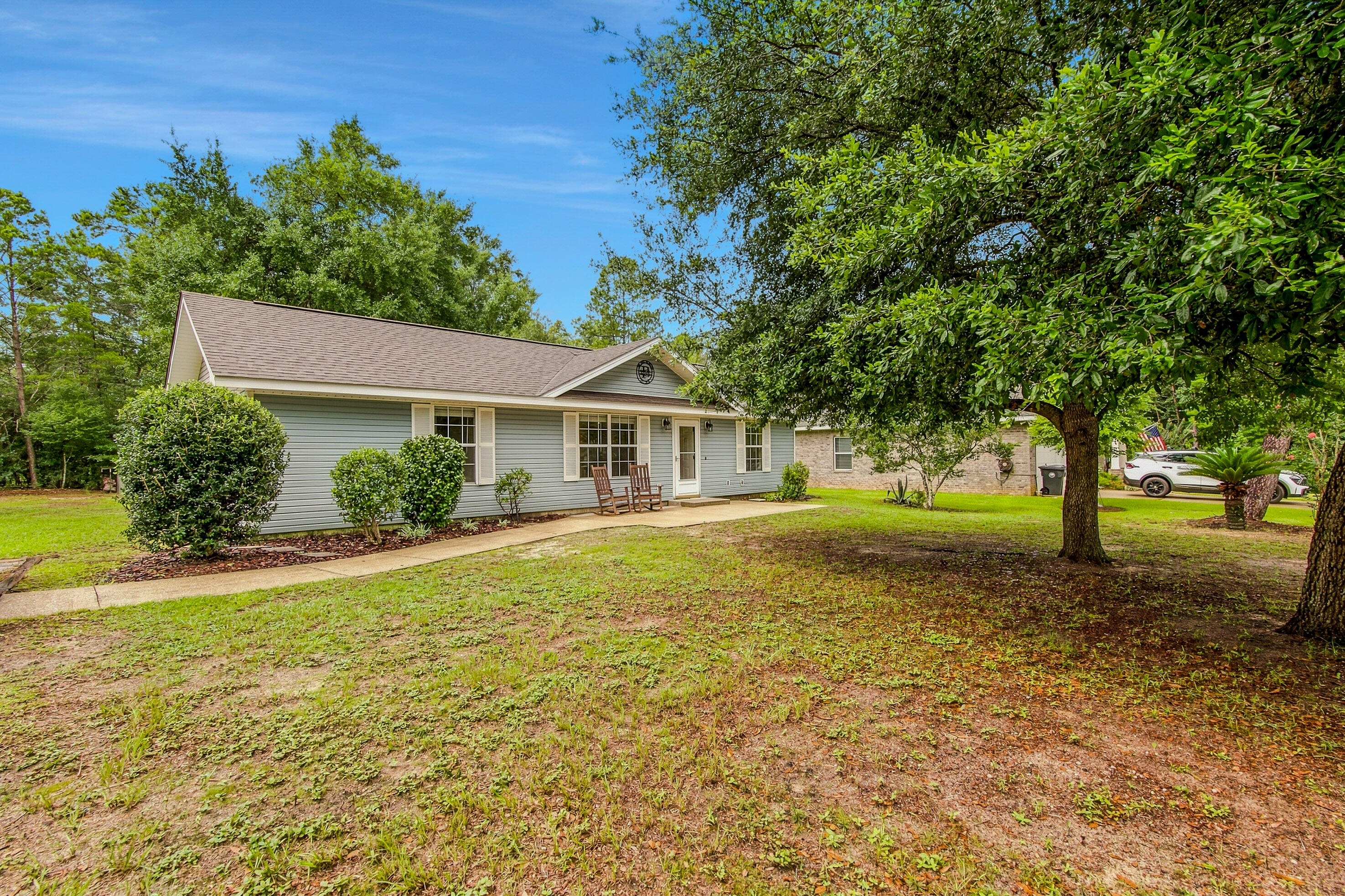 Welcome to 97 Magnolia Landing Drive in the heart of Freeport, Florida! This beautifully maintained 3-bedroom, 2-bath home sits on a spacious 0.39-acre lot, offering the perfect blend of comfort, functionality, and outdoor living. Better yet, NO HOA! Seller is offering $6,000 towards Buyers Closing Costs with accepted offer! 

From the moment you arrive, you'll appreciate the home's excellent curb appeal and inviting presence. Inside, you'll find a clean, well-cared-for interior with a gas fireplace being the focal point of the living area as you walk in. This house is truly move-in ready, making it easy for the next owner to settle in and feel at home. 

Step outside to enjoy the covered back patio, an ideal spot for morning coffee, weekend barbecues, or simply relaxing while overlooking the backyard. The partially fenced yard provides plenty of space for pets, play, or gardening, while the storage shed offers extra room for lawn equipment, tools, or hobbies. The small covered area off the shed also makes an excellent spot for a small vehicle to park.

Conveniently located near Freeport's schools, shopping, dining, and just a short drive to the beautiful Emerald Coast beaches, this property offers the peaceful lifestyle you've been searching for with everyday conveniences close by.

If you're looking for a home with charm, space, and exceptional value, 97 Magnolia Landing Drive is ready to welcome you home. Schedule your private showing today!