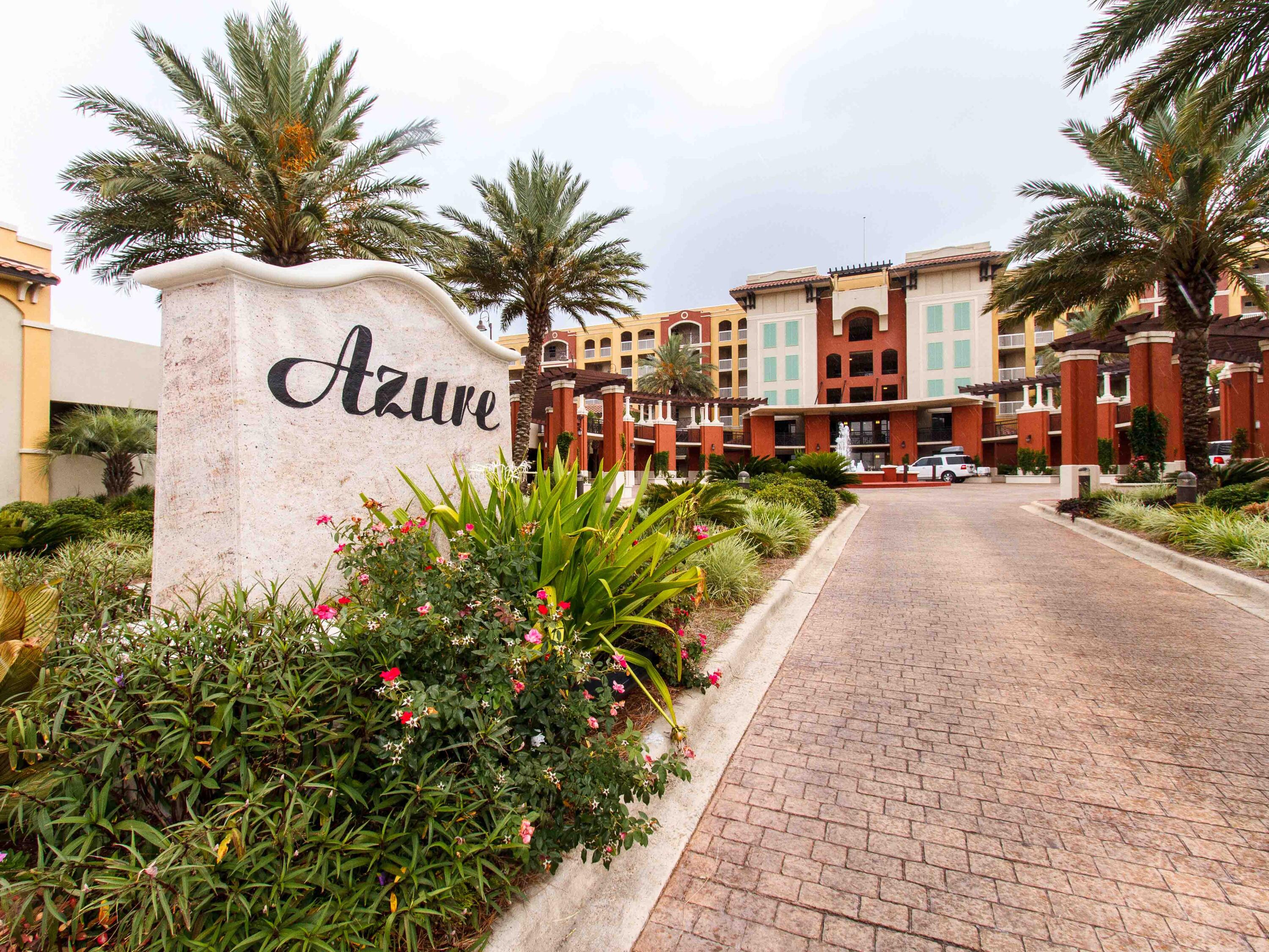 Rare beachfront find and unbeatable investment opportunity! Stellar $114K of Gross Rent for both 2023 and 2024! $94K for 2025 despite the extensive resort renovations and complete closure during October, November and most of December. $91K on the books as of June 2026. Expecting around $100K for the full year. DIRECT WALK-UP ACCESS TO THE BEACH! This stylishly decorated, fully furnished condo is centrally located on the Gulf side of the beautiful AZURE Condominium resort. Prime location on the ground floor with easy access to the pool area and the sugar-sand beaches just beyond make this unit one of the most desirable rentals in the complex. Quick and convenient access to the covered parking garage and no need for stairs or elevators. Perfect for a second home, primary residence or a lucrative investment property. The unit features tile throughout (no carpet). HVAC system replaced in Dec 2023. Water heater and dishwasher replaced in Dec. 2021. The Azure Resort underwent an extensive refresher remodel in 2025.