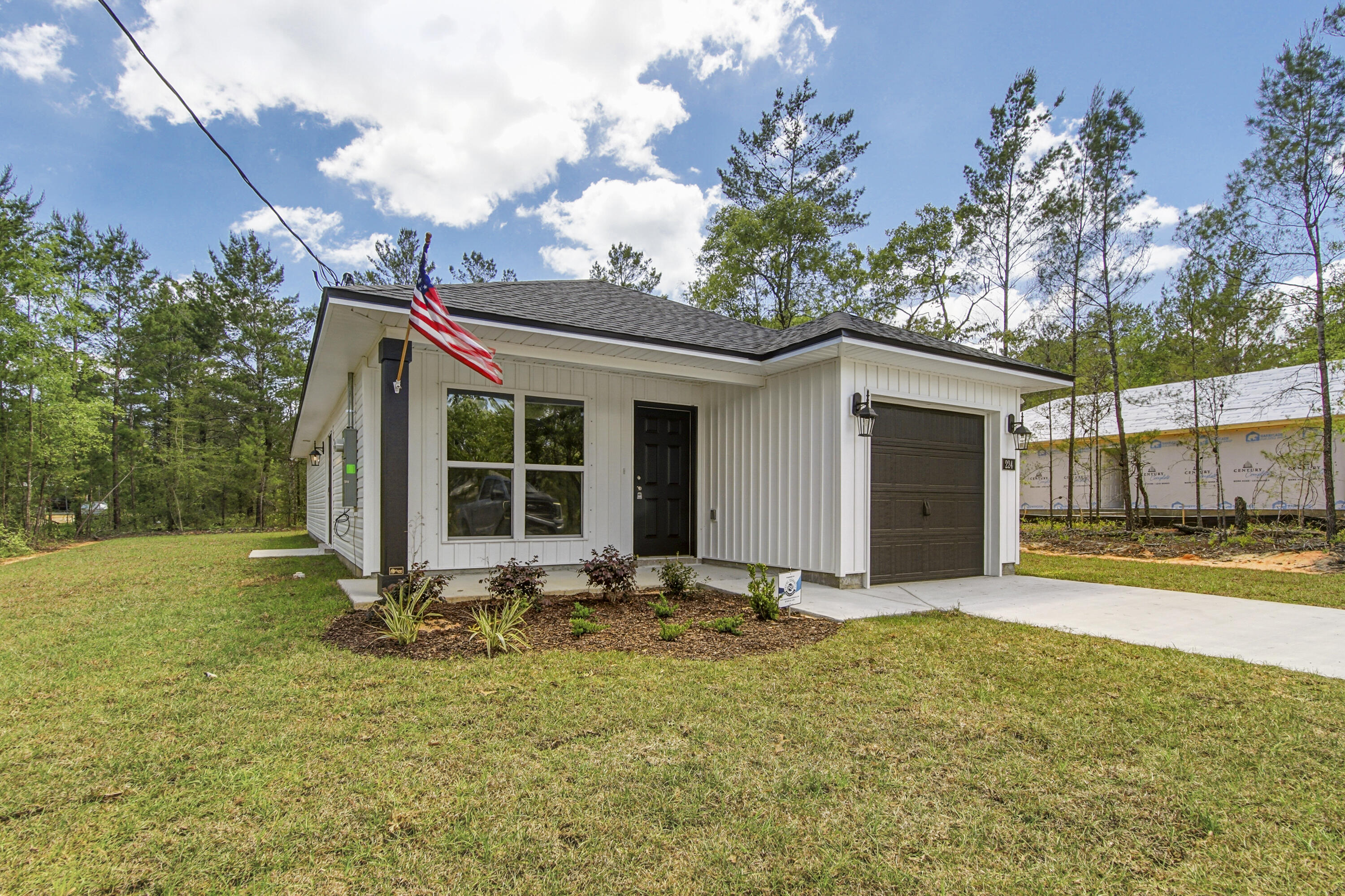 Fresh, simple, and easy to love. This newly built home by Flynn Built offers 3 beds, 2 baths and a single car garage, with a light, open layout that feels comfortable and livable. Inside, you'll find durable LVP flooring throughout, granite countertops throughout, and a bright, airy feel that makes the space live larger than expected. The exterior features low-maintenance vinyl siding, making upkeep easy. Also included is a one-year builder warranty for added peace of mind. Plus, with a full-price offer, buyers receive $6,000 toward closing costs, making this a super option for first-time buyers, those downsizing, or anyone looking for a clean, move-in ready start.