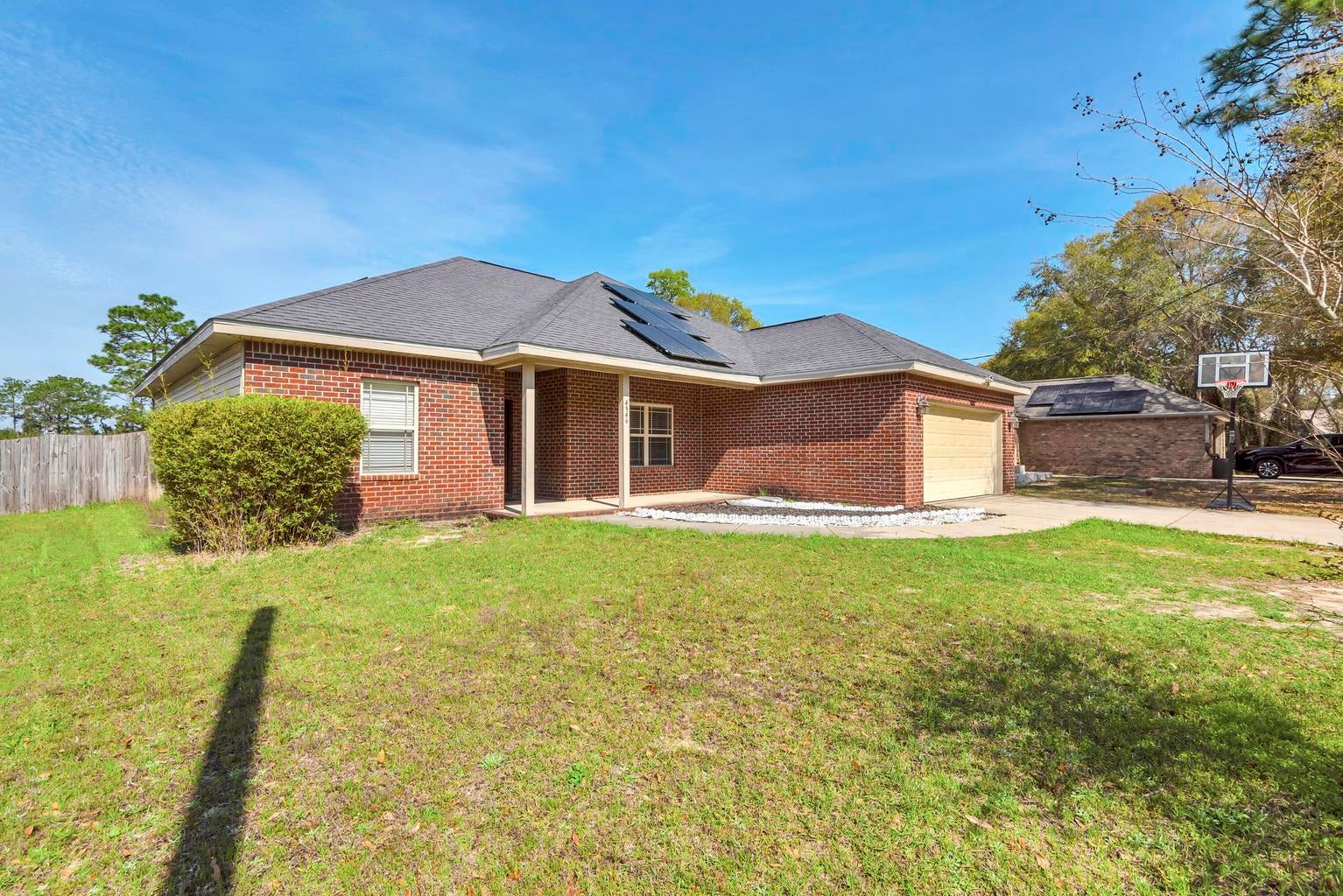 Beautiful home located in South Crestview, close to Duke Field and Eglin AFB.  A standout feature is the energy saving solar panel system, helping reduce electricity costs while providing a more energy efficient lifestyle.

This 4 bedroom, 2 bath contemporary style home features a split floor plan,  laminate and tile floor in the living area and Kitchen, high ceilings, large fenced yard, 2 car garage!  

Move in ready and available today!