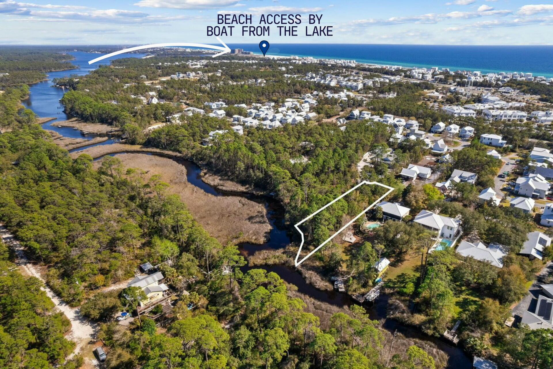 This exceptional half-acre lot in North Inlet Beach offers a rare opportunity to create a waterfront retreat with direct access to the gulf via Lake Powell. Please see video. With 142 feet of pristine lake frontage, the possibilities are endless -- imagine building a custom home designed to take full advantage of breathtaking views while enjoying the convenience of launching a boat, paddleboard or kayak right from your backyard.  

Located just minutes from the sugar-white sands of the gulf and the charming community of Rosemary Beach, this property is surrounded by an area known for its scenic beauty, upscale shopping and world-class dining. Whether you're looking to design a serene private residence or an investment property, this location