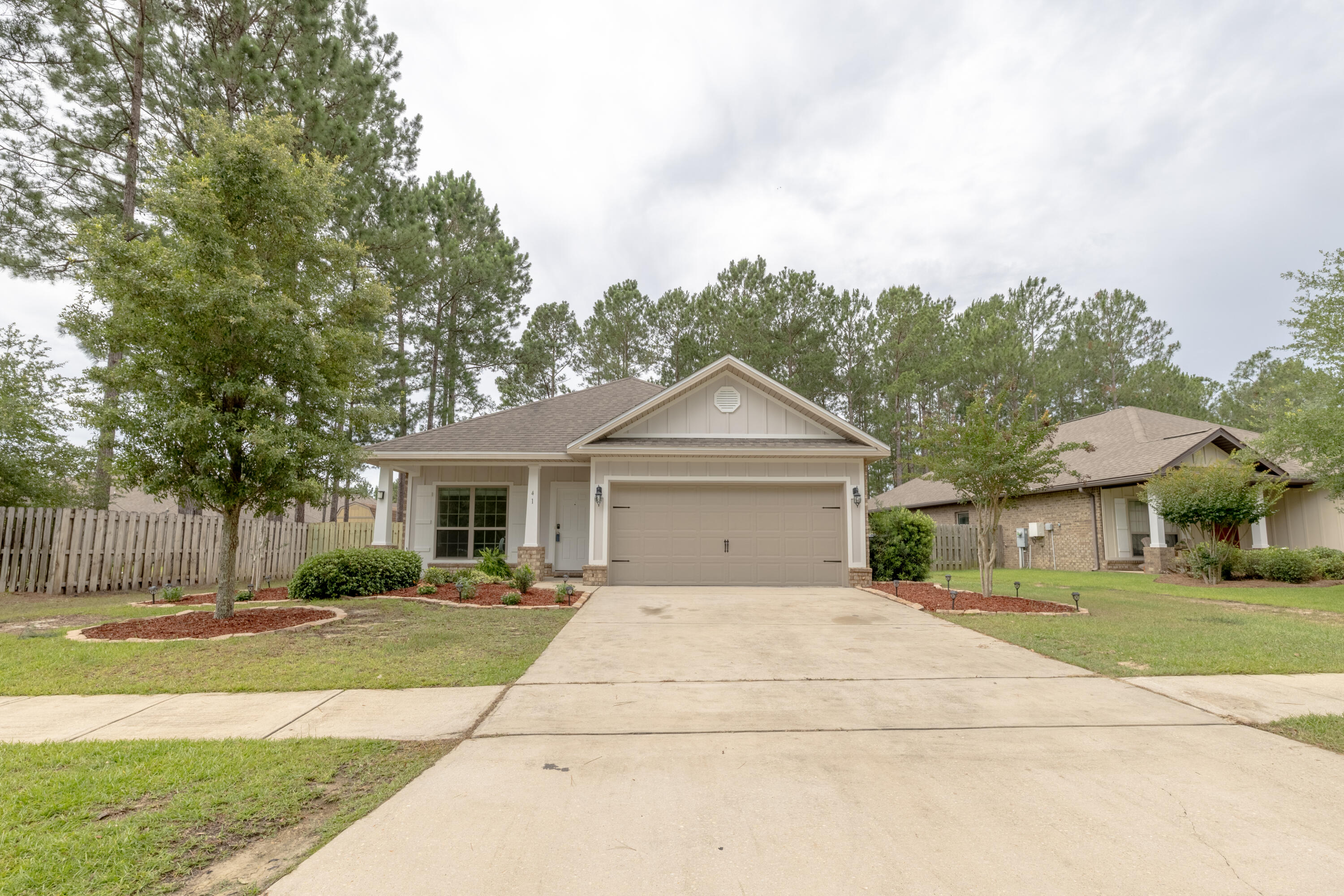 SELLER OFFERING UP TO $5,000 IN FLEX CASH to be used toward buyer closing costs, prepaids, or other allowable expenses with an acceptable offer!

Don't miss this incredible opportunity to own a beautifully updated home on a large wooded lot in the highly desirable Passages of Hammock Bay community. This meticulously maintained 3-bedroom, 2-bath home with a versatile flex space offers the perfect blend of comfort, privacy, and modern upgrades.

The home has undergone extensive improvements in May 2026 (this year), including fresh interior and exterior paint, giving the property a clean, modern feel throughout. Additional recent upgrades include all new ceiling fans, light fixtures, recessed lighting, bathroom mirrors, faucets, hardware, and designer finishes that elevate the entire home.



Inside, you'll find beautiful cabinetry, granite countertops, and upgraded tile plank flooring that extends throughout the entire home, creating a seamless and elegant look. The spacious primary suite features a professionally designed custom closet system with built-in storage and a stunning fully tiled walk-in shower.

Outside, the improvements continue with brand-new privacy gates, including a double gate providing convenient backyard access. Situated on a quiet dead-end street, this home enjoys one of the most private settings in the neighborhood. With no homes directly in front or behind the property, you'll enjoy peaceful wooded views and exceptional privacy year-round.