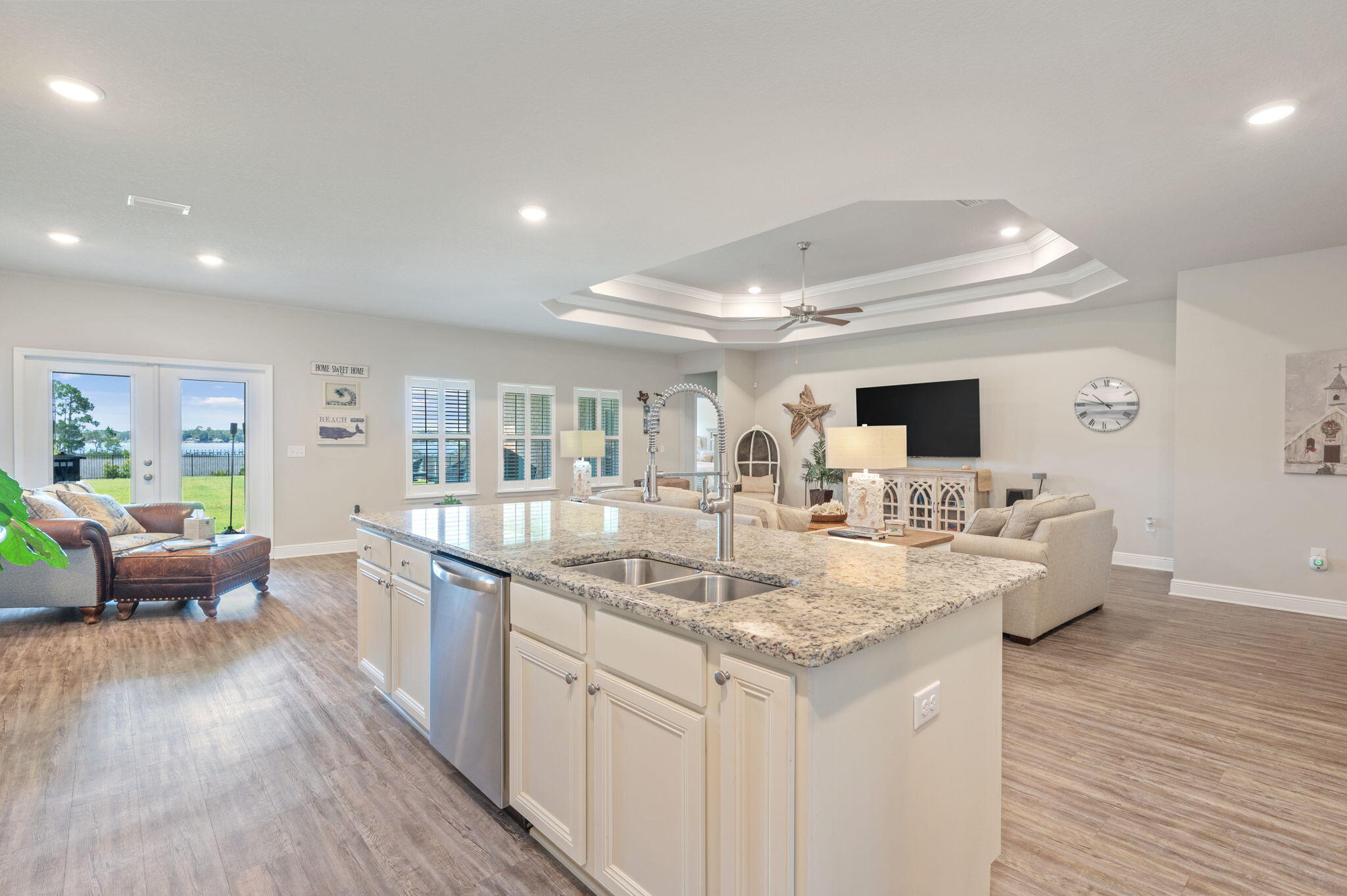 Perfectly positioned on nearly an acre at the end of an exclusive private cul-de-sac, this exceptional bayfront estate offers an extraordinary opportunity to experience the very best of coastal living. Built in 2019, this meticulously crafted residence combines timeless elegance with modern design, all framed by sweeping waterfront views and the peaceful beauty of nature.
Designed for both grand entertaining and comfortable everyday living, the home features 5 spacious bedrooms, 3 full bathrooms, a private home office, a formal dining room, and a charming breakfast nook overlooking the bay. Expansive windows flood the open-concept living spaces with natural light while capturing stunning water views from nearly every angle.
At the heart of the home, the gourmet kitchen flows effortlessly into the living and dining areas, creating an inviting space for gathering with family and friends. The formal dining room is ideal for hosting memorable dinners, while the breakfast nook provides the perfect place to enjoy your morning coffee as the sun rises over the water. A dedicated home office offers a quiet retreat for remote work or creative pursuits.
Step outside and discover your own private coastal sanctuary. Nearly an acre of beautifully situated property provides endless possibilities for outdoor living, recreation, and future enhancements. Watch breathtaking sunsets paint the sky, enjoy the soothing bay breeze, launch a kayak or paddleboard from your backyard, or simply relax as dolphins play offshore and native birds soar overhead.

Adding to the property's rare charm, an active egret rookery on the neighboring property creates a remarkable natural backdrop, offering a front-row seat to one of the Gulf Coast's most captivating wildlife experiences.

Offering the perfect balance of luxury, privacy, and nature, this remarkable waterfront residence is more than a home--it's a destination. Opportunities to own newer construction on nearly an acre of bayfront property in such a secluded setting are exceptionally rare. This is coastal living at its finest.