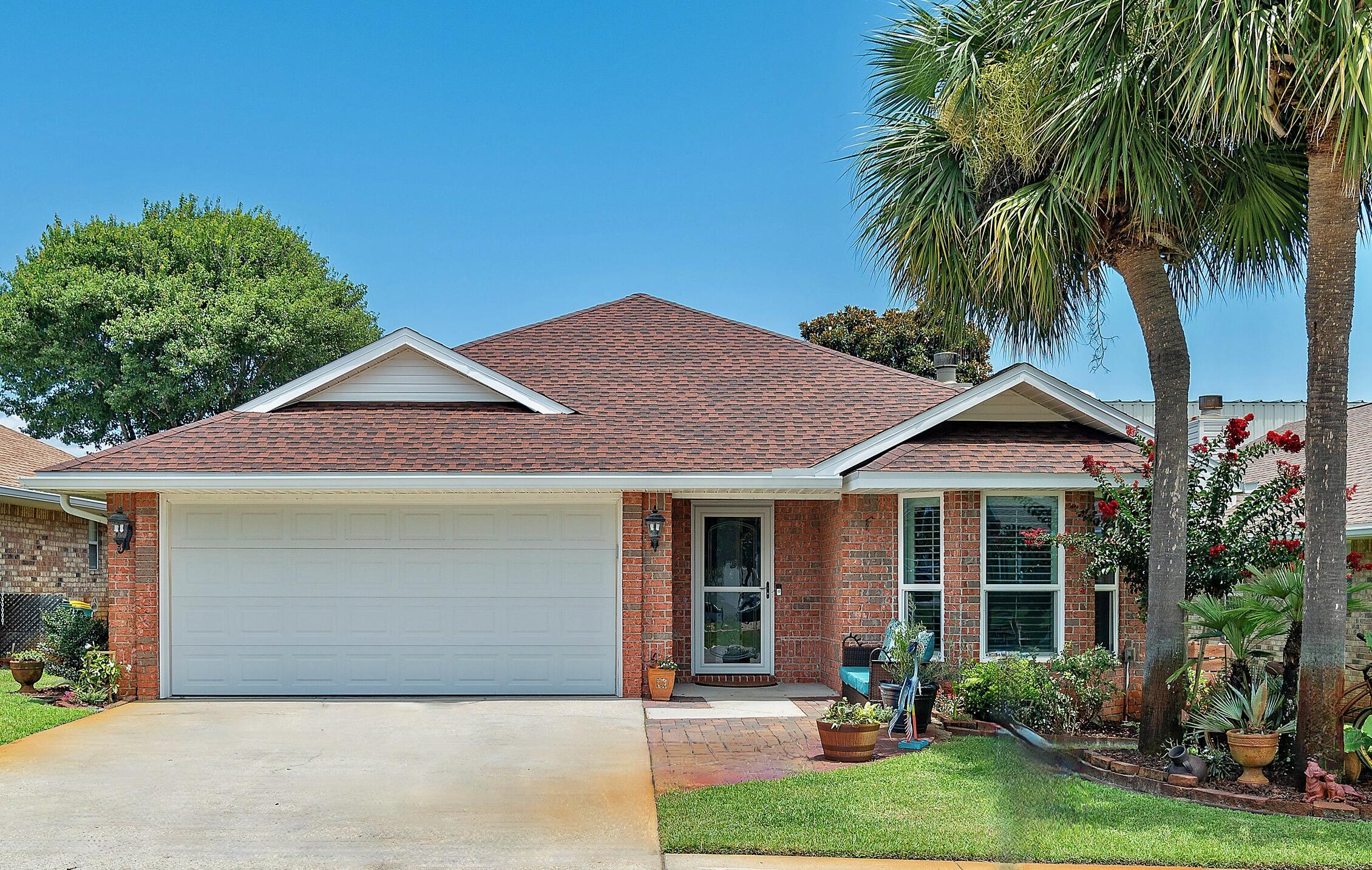 Price Reduced, and ready to sell!! Located south of 98 makes this home a prime location for those desiring the beach lifestyle. Its a short golf cart ride to the beach, shopping, restaurants, and more! A great opportunity for full time residents, or use it as an investment with the ability to short term rental in this neighborhood. The community pool is just steps away! This immaculate home is fully updated throughout, including hurricane Impact resistance windows, custom doors, plantation shutters, custom cabinets with soft close doors, granite countertops, subway tile backsplash, premium KitchenAid Duel Fuel Range, Farmhouse stainless steel kitchen sink, premium light fixtures and fireplace with coordinated subway tile, just to name a few.  Rental projections up to 60K.  Roof replaced in 2020 comes with a transferrable warranty. HVAC replaced in 2021