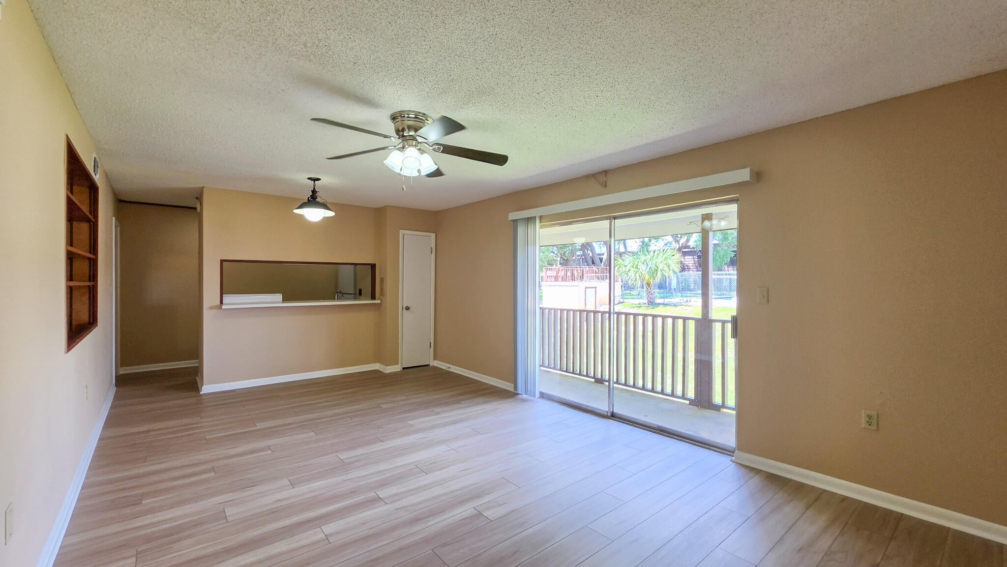 Beautifully updated Spanish Villa Condo in the heart of Fort Walton Beach! Step inside to find durable and stunning NEW VINYL PLANK FLOORING throughout the residence, creating a clean and modern feel, with a FRESHLY PAINTED INTERIOR. The connected dining and living areas lead to your personal balcony, overlooking the pool, conveniently only a few feet away. The balcony is completed with a laundry/utility room, featuring a washer and dryer hookup. The two bedrooms offer generous living and closet space, perfect for comfortable living. The master and full bathroom, freshly updated with stunning marble undermount sink countertops, also featuring beautiful white-tiled showers, bringing a bright feel to both bathrooms. Residents have access to amenities that include a generously sized swimming pool, tennis court, and clubhouse.