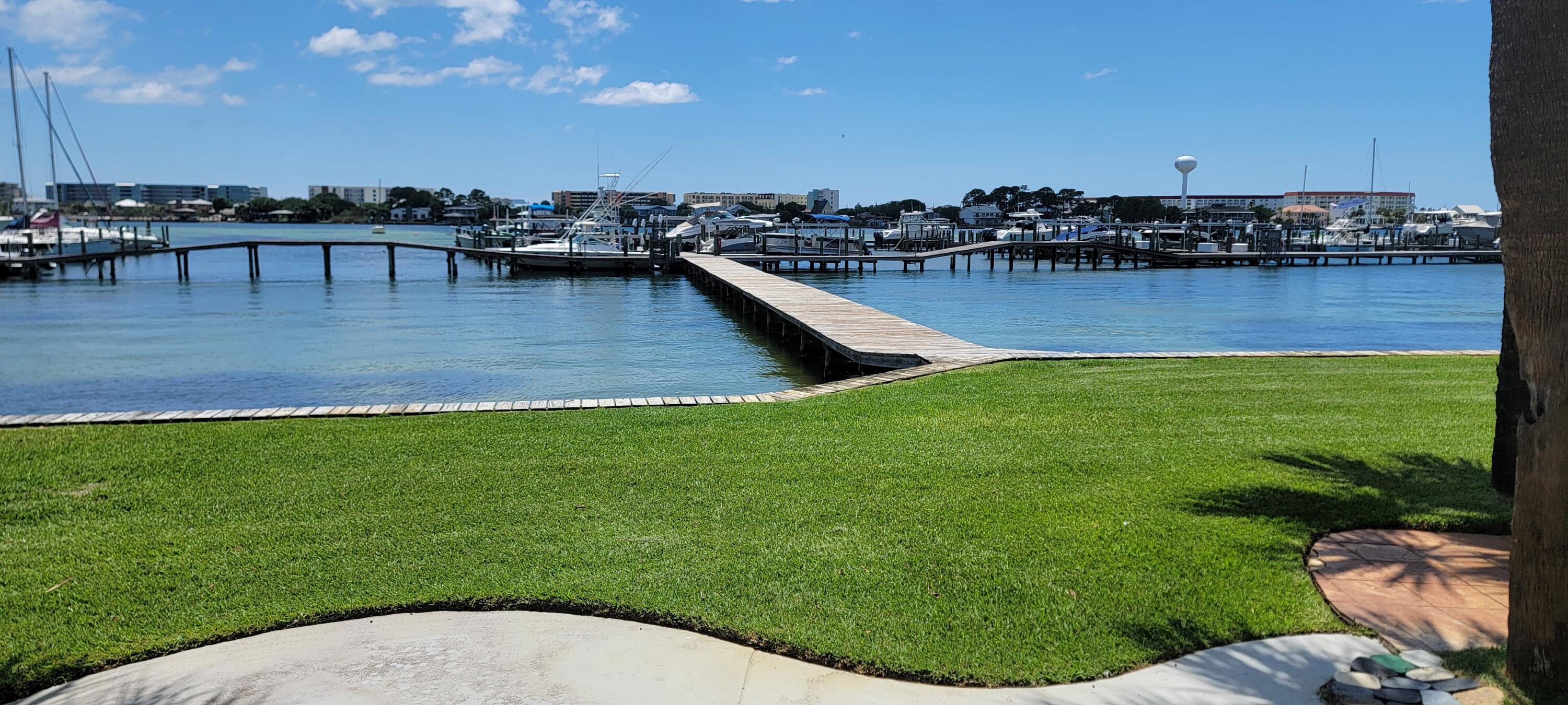 Amazing views from this waterfront home. Rare opportunity to own one of the few townhomes in this waterfront complex. These rarely come on the market and always sell quickly. This 2 Bedroom 2.5-bathroom home is move in ready or a blank canvas ready for your imagination. Just picture yourself on the patio or deck enjoying the views. This home also comes with it's own deeded boat slip. So you can enjoy a day on the water and return home for a relaxing night watching the sunset from the comfort of your patio or balcony.