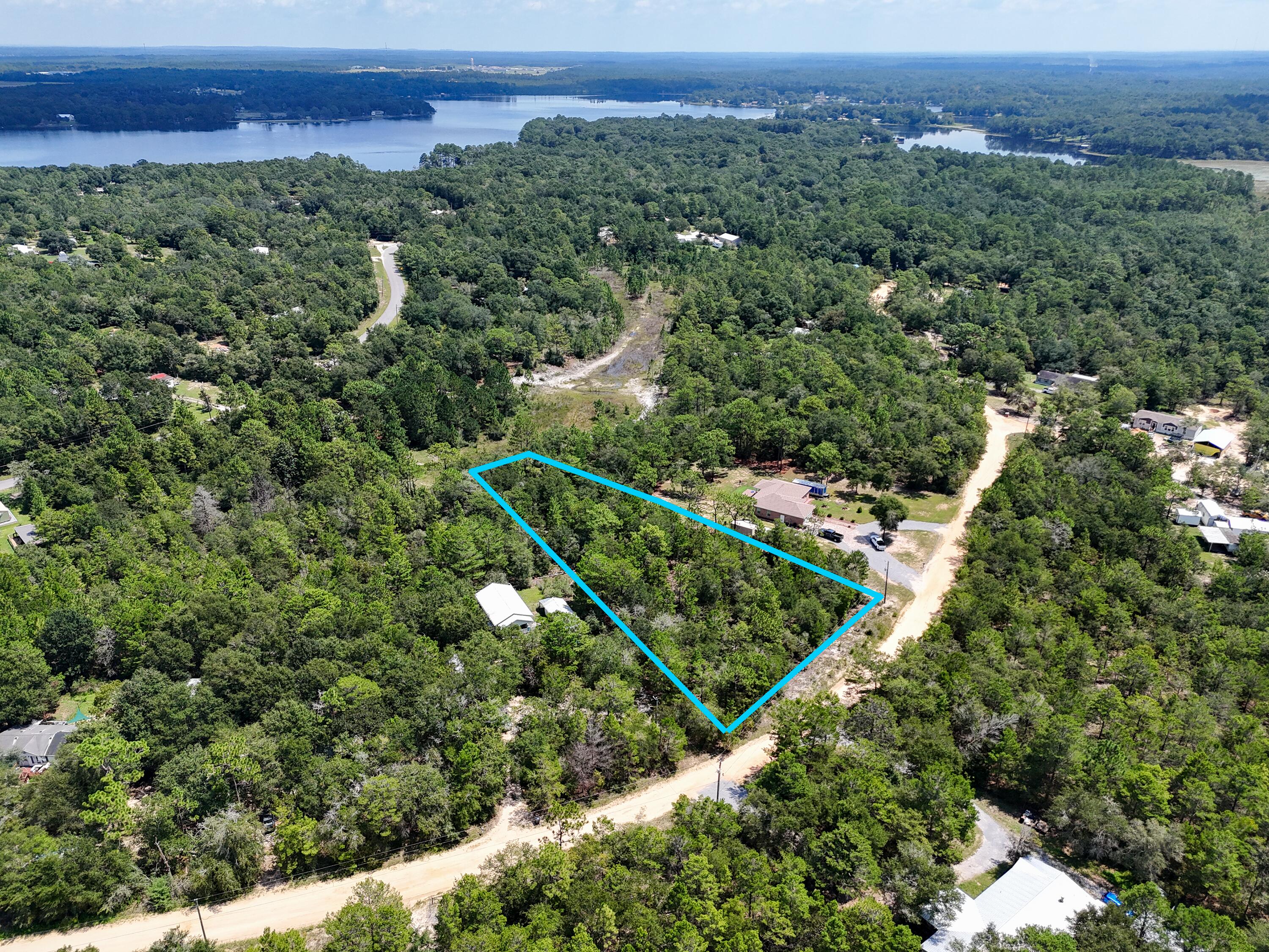 Located North on 331 this wooded lot l offers 1. 25 acres in the Juniper Lake area. Lot is wooded with mostly all the underbrush gone making the lot easy for you to clear and be able to move your brand-new mobile home to or build a home! Property has water available but will require a septic tank. Power on road for easy access for electricity! This large parcel is just minutes back to town, minutes to public boat launch to Lake Juniper This size parcel is a rare find at this price!
