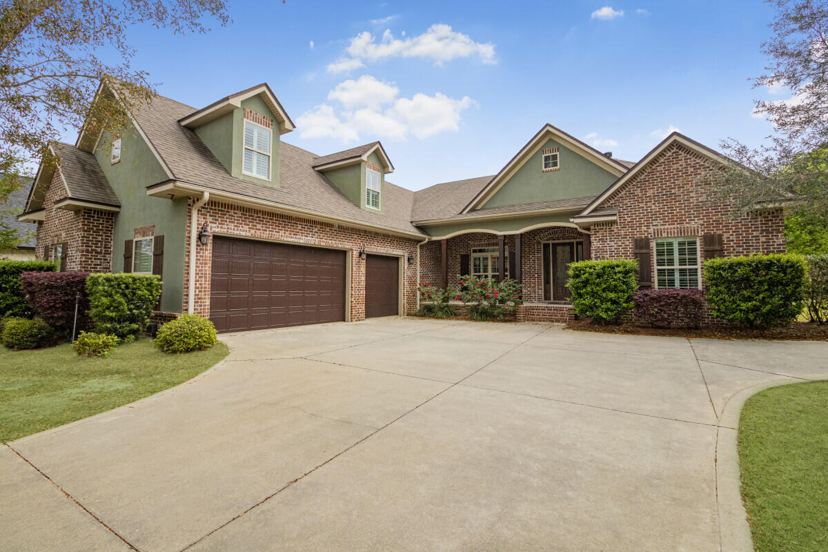 Exquisite Custom-Built Golf Course Home in Hidden Creek - 
4 Bedrooms + Office + Bonus Room |  3 Full Bathrooms |  3,741 SF Total Living Space |  3-Car Insulated Garage

Discover luxury living in one of Navarre's most prestigious neighborhoods--Hidden Creek Estates--situated directly on the 11th Tee Box of the award-winning Hidden Creek Golf Course. Built as the personal residence of a respected custom home builder, this residence is a showcase of premium craftsmanship, thoughtful design, and one-of-a-kind upgrades.

Home Features
4 Bedrooms + Office (or 5th bedroom) + Oversized Bonus Room above garage

3 Full Bathrooms including an en-suite guest suite with walk-in shower

Large Covered Lanai with Outdoor Kitchen & Sink - perfect for entertaining

Cypress Wood Ceilings on front and rear porches with brick knee wall accents

Expansive living room with stacked-stone wood-burning fireplace and custom built-ins

Custom Upgrades
Spray Foam Insulation (walls & roof) for energy efficiency

14.2 SEER, 3-Zone HVAC System - replaced October 2024

Whole Home Generator (Gas) and Buried Propane Tank

Garage Fully Insulated with Mini-Split HVAC 

8' Tall Insulated Garage Doors - fits large trucks or SUVs

Utility Sink + Personnel Door in garage

Aluminum Picket Fencing enclosing backyard

Smart Living Features
Whole Home Audio System

Central Vacuum System

Security System with Low Voltage Closet + Tech Panels

Christmas Light Outlets on Timer Double Step Ceilings, 7" Crown Molding, Trey Ceilings in Bedrooms and Office

Recessed Lighting in Master & Office

 Gourmet Kitchen Highlights
36" Gas Cooktop, Wall Oven/Microwave Combo

Custom Wood Vent Hood fully vented

Walk-in Pantry, Granite Surfaces, and spacious prep areas

 Spa-Like Master Suite
72" Jacuzzi Tub

Oversized Walk-In Tile Shower with dual shower heads

Tray Ceiling, Crown Molding, and recessed lighting for a luxury feel

Enjoy serene golf course views from your lanai, complete privacy in a well-planned split floorplan, and all the benefits of a high-performance, energy-efficient home. With no detail overlooked and thoughtful design throughout, this home is a rare opportunity in Navarre--Florida's Best Kept Secret.