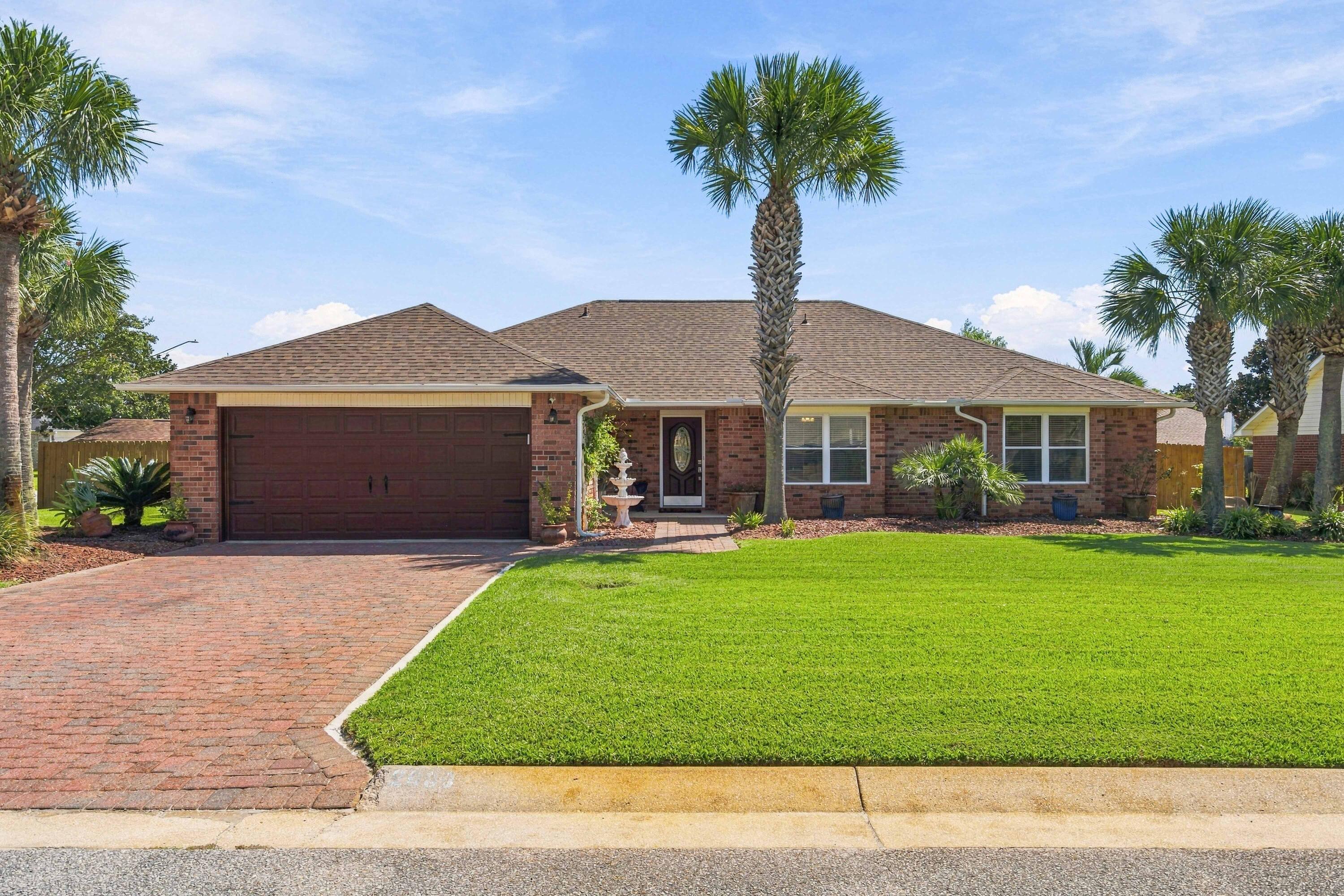 Welcome to 2088 Jessica Way, a beautifully maintained Navarre retreat featuring a gorgeous pool, deeded water access with a community pier, a 2022 roof, 2023 windows, and stunning Brazilian Cherry hardwood floors. Thoughtfully created as a forever home, this property reflects pride of ownership and attention to detail throughout.

Inside, you'll find custom shutters, a custom built bookshelf in the study, surround sound, a security system, and beautiful finishes throughout. The garage is exceptionally functional with a mini split system, built in cabinets, and a workbench. Additional features include a water softener, and custom metal storm shutters for the windows.

The outdoor space is truly something special. The gorgeous pool, hot tub, gazebo, storage shed, irrigation system, low voltage landscape lighting, and beautifully maintained yard create your own private Florida retreat. Whether entertaining by the pool or enjoying a quiet evening outside, this home was made for enjoying the Florida lifestyle.

The community offers deeded water access and a community pier, providing a wonderful place to fish, enjoy the coastal waters, or take in unforgettable sunsets.

Beautifully cared for inside and out, this home is a true gem in Navarre. From the thoughtful details throughout the home to the incredible yard, pool, and waterfront community access, 2088 Jessica Way is one you will want to experience in person.