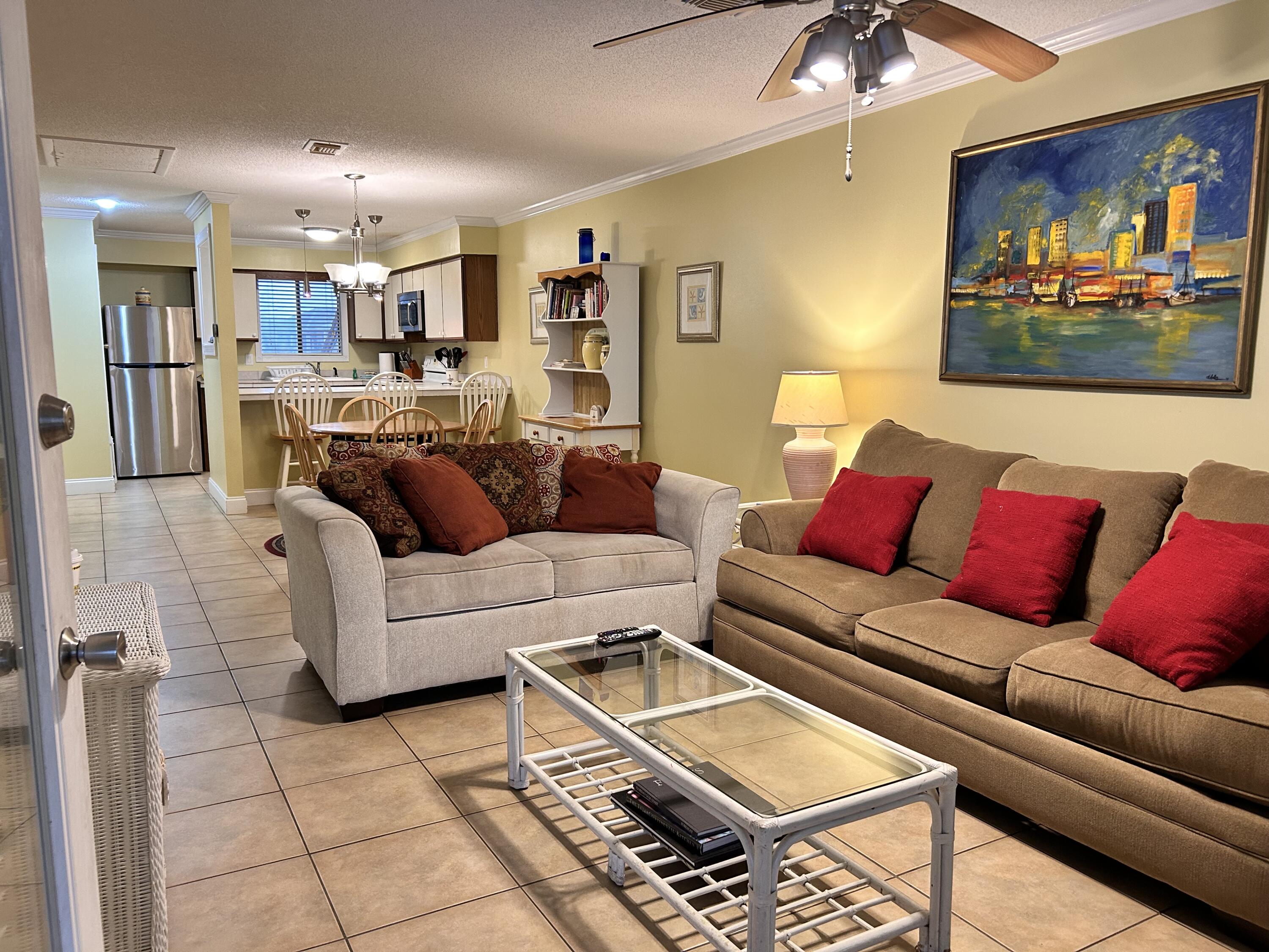 Experience waterfront living at The Palms of Sunset Harbor on Navarre Beach. This furnished condo offers wide views of the Santa Rosa Sound and convenient access to the Gulf's renowned shoreline. The Palms provides a private beach area, pool, fishing pier, gazebo, and BBQ stations for owners and guests. Located near the Gulf Islands National Seashore, the setting offers a balance of privacy and proximity to local activities. The unit features a queen bed, full kitchen, dining space, and easy access to both Sound and Gulf waters. Buyer to verify all information.