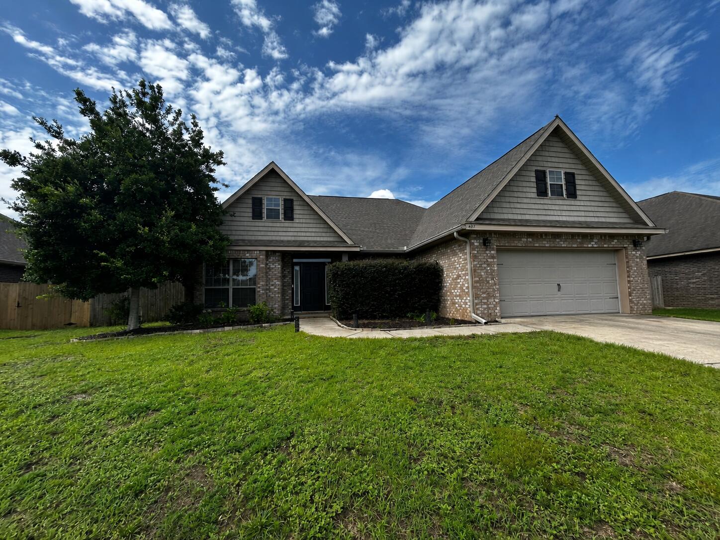 Welcome home to this beautifully maintained 3-bedroom, 2-bath residence situated on a generous quarter-acre lot. From the moment you arrive, you'll appreciate the attractive curb appeal, mature landscaping, and inviting front entry with decorative wraparound glass panels.

Inside, the thoughtfully designed floor plan offers plenty of living space, including a formal dining room, a separate study or formal living area, and a large family room that flows seamlessly into the kitchen. Architectural details such as elegant arches, crown molding, and tray ceilings in both the primary bedroom and dining area add character and charm throughout the home.

The well-appointed kitchen is perfect for everyday living and entertaining, featuring granite countertops, an undermount sink, dark maple cabinetry, stainless steel appliances, and ample counter and storage space. The open-concept layout allows you to stay connected to family and guests while preparing meals.

The spacious primary suite provides a relaxing retreat, while two additional bedrooms offer flexibility for family, guests, or a home office.

Conveniently located near shopping, dining, schools, and military bases, this home combines comfort, style, and functionality in a desirable setting.