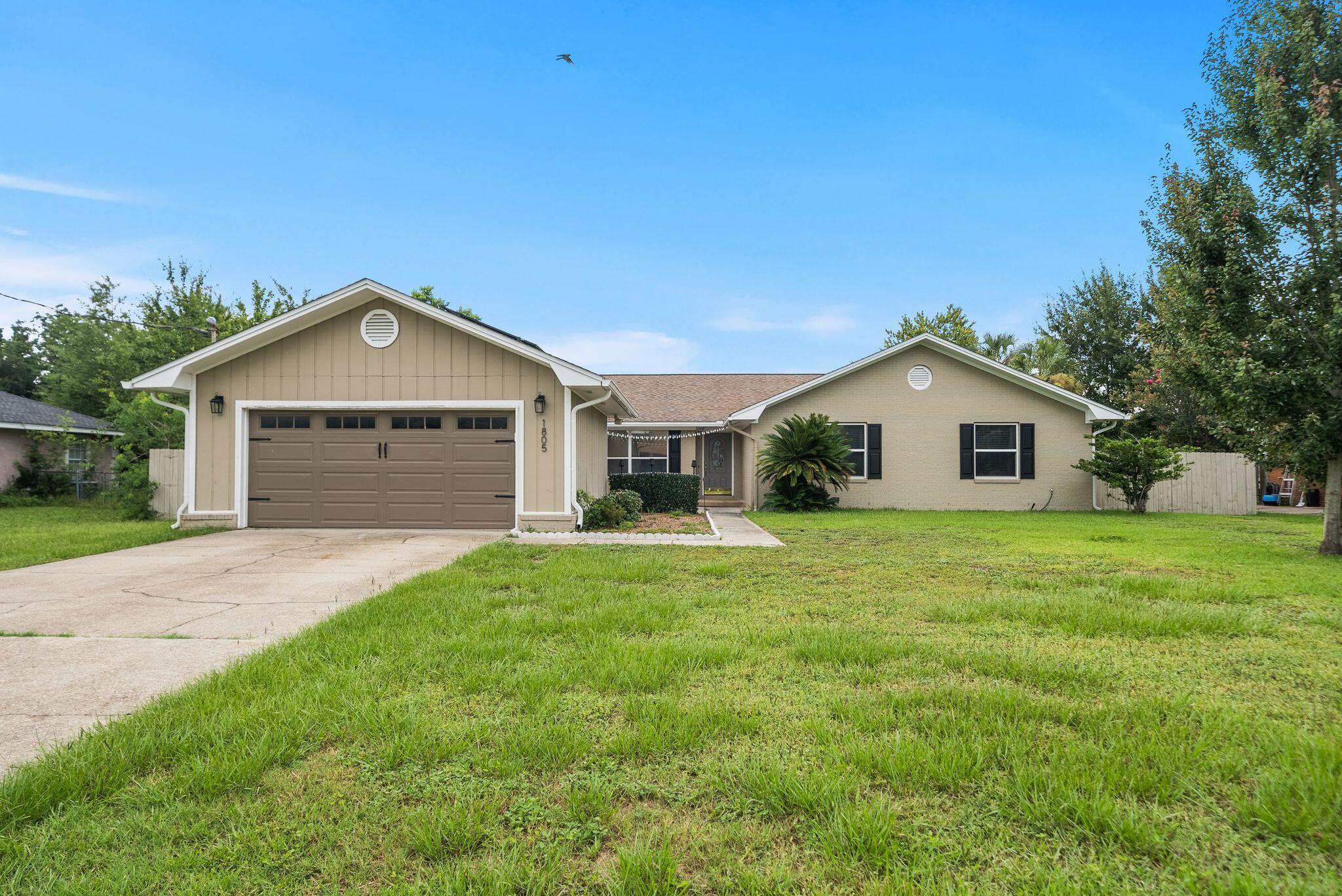 *OPEN HOUSE THURSDAY, JULY 16 | 3-5PM* Tucked right in the heart of Lynn Haven, this is what NO HOA living is supposed to feel like! With four bedrooms, two baths, a spacious sunroom, two-car garage and room for a pool in the fenced backyard...this is an ideal layout nearing 2700 square feet. 

You're minutes from Downtown Lynn Haven's walkable Main Street corridor, with its local restaurants, boutiques, and coffee shops, plus Sharon Sheffield Park for weekend farmers markets, food trucks, and the city's signature festivals and holiday events throughout the year in the ampitheater. Nature Walk Golf Course, Kaleidoscope Theatre, and Lynn Haven's A.L. Kinsaul waterfront park along the Bay are all in the neighborhood and this home offers quick access to and puts Tyndall Air Force Base, Naval Support Activity Panama City, and downtown Panama City well within reach. 

Step inside to the vaulted, beamed spacious living area with a wood-burning fireplace that flows naturally to an open, fully renovated kitchen featuring white shaker cabinetry, quartz countertops, stainless appliances and a cozy breakfast room. The dining room is just off the foyer and is filled with light from the front of the home overlooking the charming courtyard. 

Luxury vinyl plank flooring runs through the main living spaces making it durable and updated for years to come. The fully renovated kitchen brings modern finishes together with a stainless gas cooktop, wall oven and built-in microwave and dishwasher. The home features four bedrooms and 2 baths and large closets. The best part of this home is the oversized climate-controlled sunroom. This space offers unlimited flexibility and is the ultimate flex space...playroom today, home gym tomorrow, home office or second living room whenever life calls for it. Decide to build a pool? This would be an incredible space off the pool to hang out overlooking the water. 

A huge benefit to a Buyer on this home is that the solar panels will be fully paid off requiring no lease, no loan to assume and no additional cost. This benefit keeps the average electric bill around just $50 a month adding to the desire for this home over others in Lynn Haven! 

This home also features a gas water heater for efficiency for a larger family and a dedicated 220V outlet ready for EV charging. Outdoors, the fully-fenced backyard is ready for cookouts and letting dogs and kids play or just quiet evenings to yourself. 

In the ''state streets'', of Lynn Haven, you're minutes from shopping, dining, dog parks, public boat ramps and activities year-round. With NO HOA, you're going to love that you can park your boat in your driveway, load it up at your own schedule and live the Florida life you've always dreamed of. 

This home is an incredible opportunity in a highly desirable area with all A-rated, top performing public schools that this home is zoned for. There's a reason people love Lynn Haven and there's a reason it was recently named TOP 10 places to live in Florida! 

This property is also eligible for 100% financing with USDA lending. Inquire for more information!