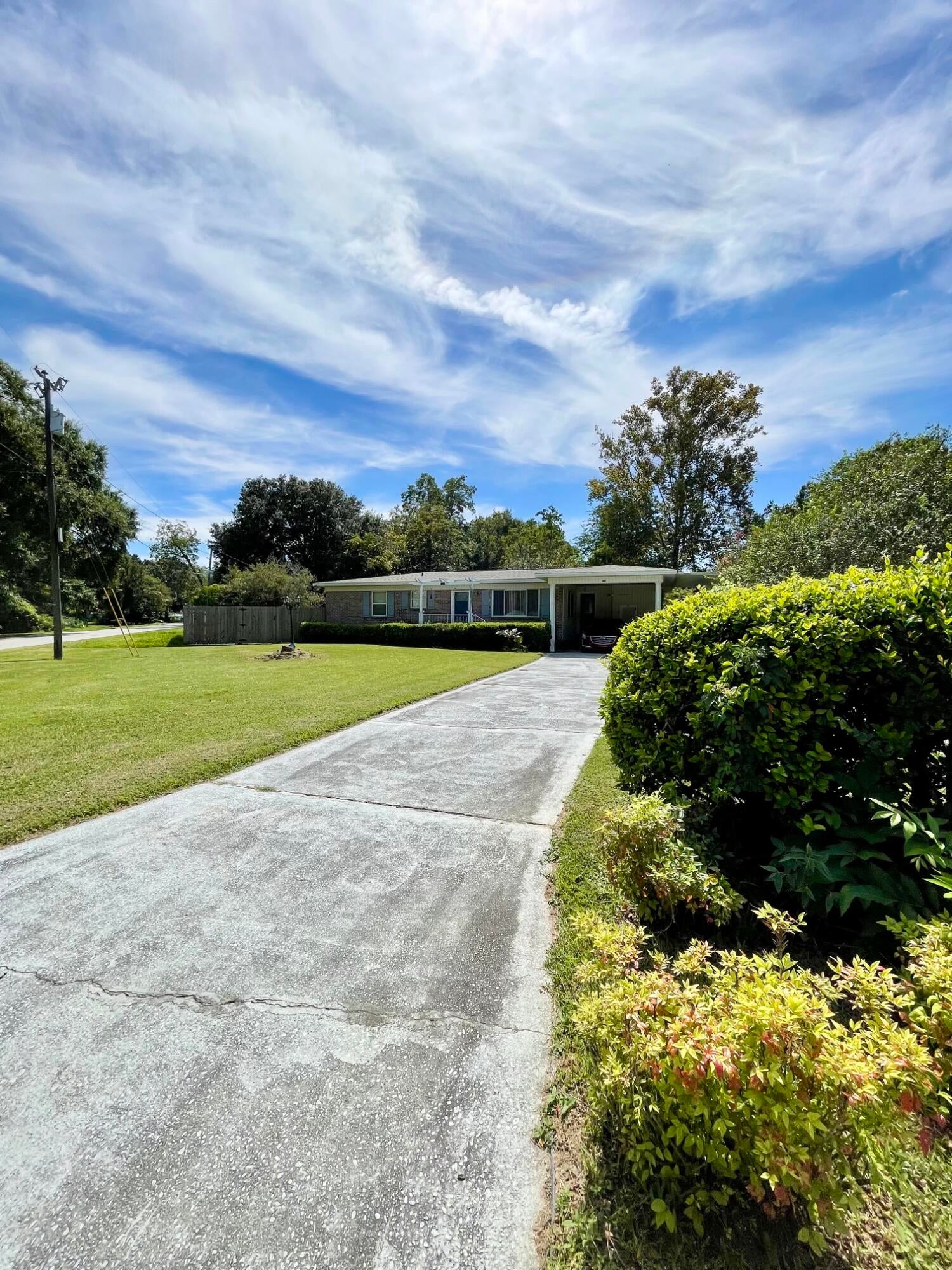 Looking for a property with a HUGE lot? Need extra room for storing your RV, BOAT, or future WORKSHOP? This is it! The home itself sits on a 1/3-acre parcel and there is an ADJOINING 1/4-acre parcel that is also included! The additional lot is cleared with some mature Pecan Trees remaining, and it is fully fenced to include a 16FT GATE in place! The main parcel also has a 14FT GATE to conveniently pull your RV into the side yard, and there is already a 30AMP hookup! In addition, there is a 12 X 20 METAL WORKSHOP with power in the backyard that has an attached 12 X 12 covered patio and LEAN-TO. The interior includes 3 bedrooms, 2 bathrooms, a dining room, living room, laundry room and kitchen. The roof was replaced in 2021, the HVAC was replaced in 2024 and there is a current Termite Plan. This area is up and coming with new facilities being built including a new Fire Station, and the brand-new Brownsville Library has just opened its doors!