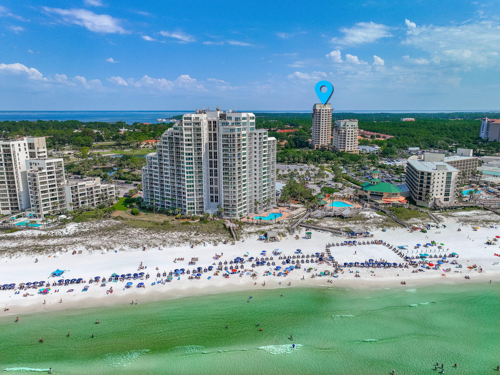 Location, location, location - Gulf Side of Sandestin Resort with VERY close access to the beach. This 7th floor, one bedroom condominium sleeps 4 is located in the popular Luau buildings with east/southeast gulf views. Coastal decor, private balcony, washer/dryer and rental history! Luau is a gated complex that offers covered parking, owner storage cage, a large saltwater pool, rooftop observation deck, grilling area, fitness center and pathway to the beach. A few of the Sandestin Resort amenities are - beach, private beach club, tunnel between north and south sides of the resort, multiple golf courses, bike/walking paths, marina, bay access, tennis, Village of Baytowne Wharf with eateries and entertainment.