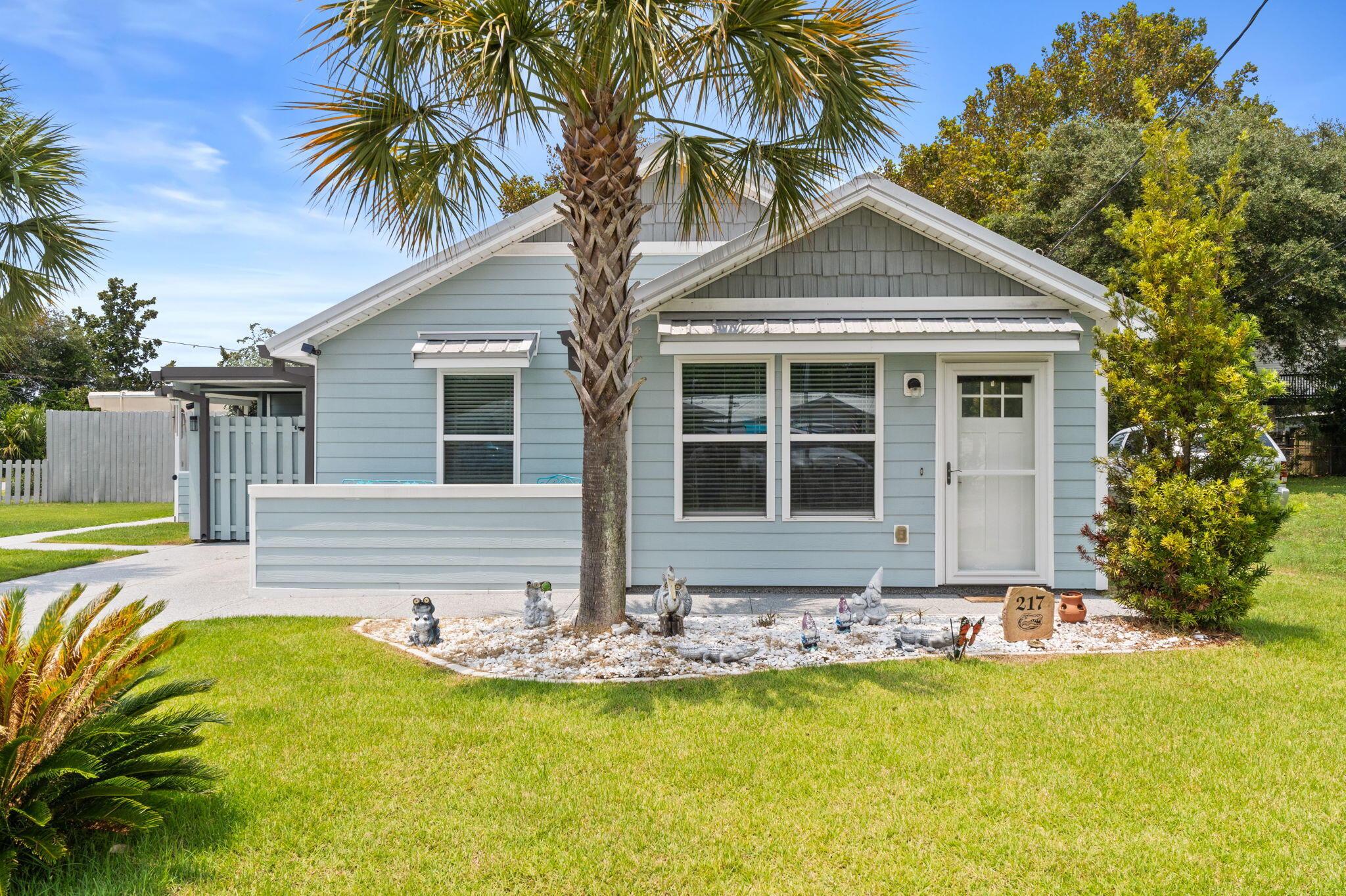Welcome to Laguna Beach Estates on the desirable west end of Panama City Beach. Built in 2018 by Guyson Construction, this beautifully maintained 2-bedroom, 2-bath home with a bonus room is ideally situated on a corner lot south of Highway 98, just a half-mile from the sugar-white sands and emerald waters of the Gulf. With short-term rentals allowed, no HOA, and no flood zone concerns, this property is an excellent option for a primary residence, second home, or investment property. Inside, you'll find an open floor plan with abundant natural light, new luxury flooring throughout, and an updated kitchen with new appliances. Additional features include energy-efficient construction, enhanced wind-resistant design, professionally coated exterior concrete for added durability, and secure enclosed golf cart parking in this golf-cart-friendly community. Conveniently located just minutes from Pier Park, 30A, shopping, dining, and entertainment, this move-in-ready home offers the perfect opportunity to enjoy the best of the Emerald Coast.