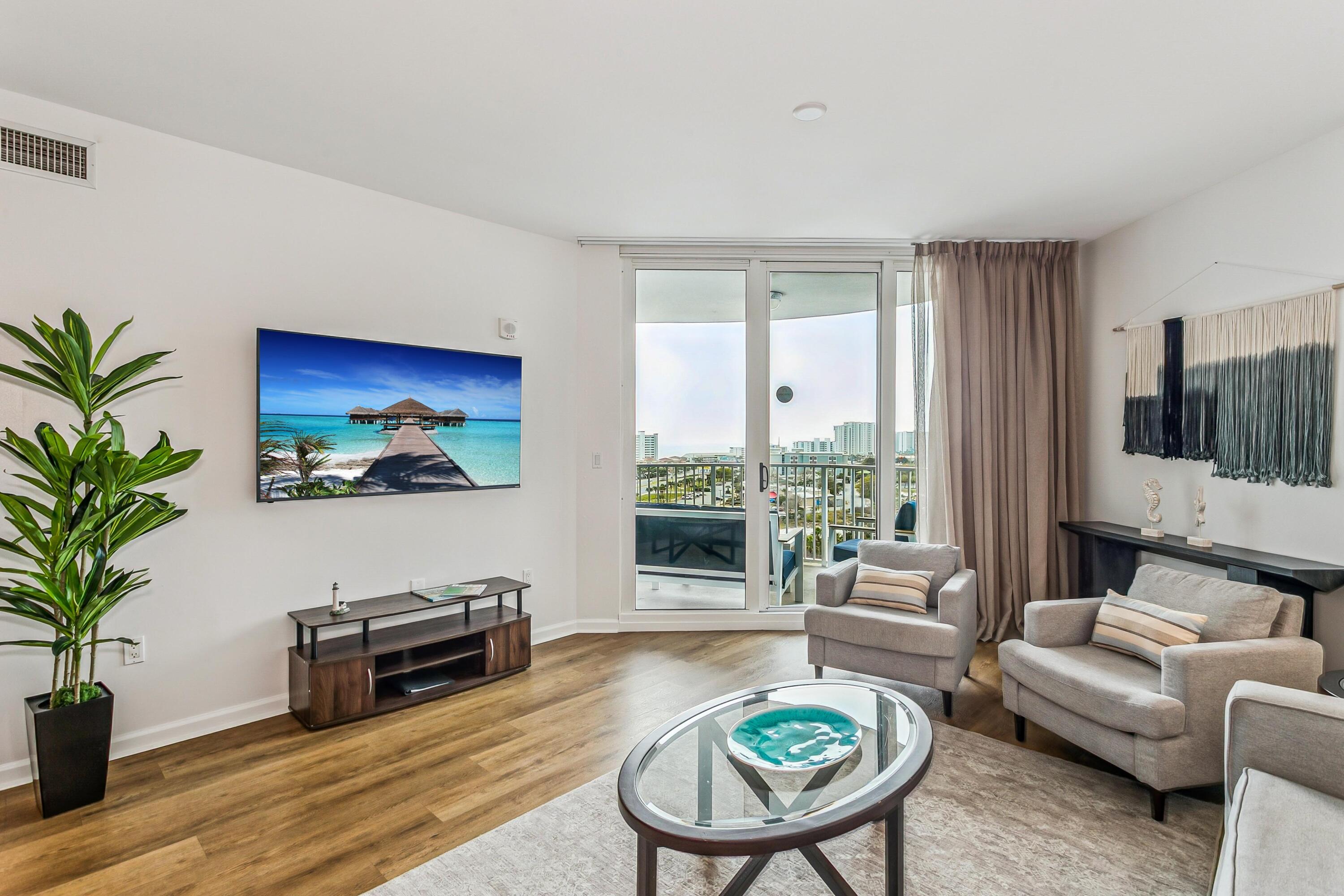 Looking for a 2-bed short-term rental condo in Destin Florida near Henderson Beach State Park with Gulf views and resort amenities? Residence 11013 at The Palms of Destin Resort and Conference Center offers a fully renovated 10th-floor residence in Building 2 with spectacular views overlooking the lagoon-style pool and the Blue Lagoon restaurant, along with views of the Gulf of Mexico from the private balcony. Offered at $360,000, this turnkey property combines a prime Destin location, strong guest appeal, and one of the most recognizable resort environments along Florida's Emerald Coast. Inside, the 970-square-foot layout provides a comfortable and efficient two-bedroom, two-bath design that works well for both vacation stays and rental guests. The open living and dining area flows naturally toward the private balcony, allowing residents and visitors to enjoy elevated views across the resort's central amenities and the surrounding Destin skyline.

The residence was completely renovated in 2025 and refreshed with new flooring, fresh interior paint, updated bedroom furnishings, curated artwork, refreshed kitchenware, balcony furniture, and smart televisions. The updated interior creates a clean coastal atmosphere while remaining durable and practical for vacation use.

The Palms of Destin Resort and Conference Center is known for its extensive amenities and convenient location within the city of Destin. Residents and guests have access to a large lagoon-style pool with zero-entry design and expansive sunbathing areas, along with on-site dining at the Blue Lagoon restaurant, tennis courts, a fitness center, landscaped recreation areas, and a seasonal shuttle service that connects visitors to nearby beaches, shopping areas, restaurants, and entertainment venues throughout Destin.

Beach access is located directly across the street at June White Decker Public Beach Access on Restaurant Row, while Henderson Beach State Park offers additional shoreline, scenic coastal dunes, and nature trails just minutes away.

Quarterly HOA dues of $3,598.18 include electricity, water, sewer, cable television, internet service, building insurance, security, groundkeeping, management, and access to the community's recreational facilities. The one-time new buyer fee is $1,199.40. Property taxes for 2025 were $3,227.20.

With its 10th-floor elevation, full interior renovation, resort amenities, and proximity to Destin's beaches, Residence 11013 presents a compelling opportunity for buyers seeking a vacation home, second residence, or income-producing property along Florida's Emerald Coast.