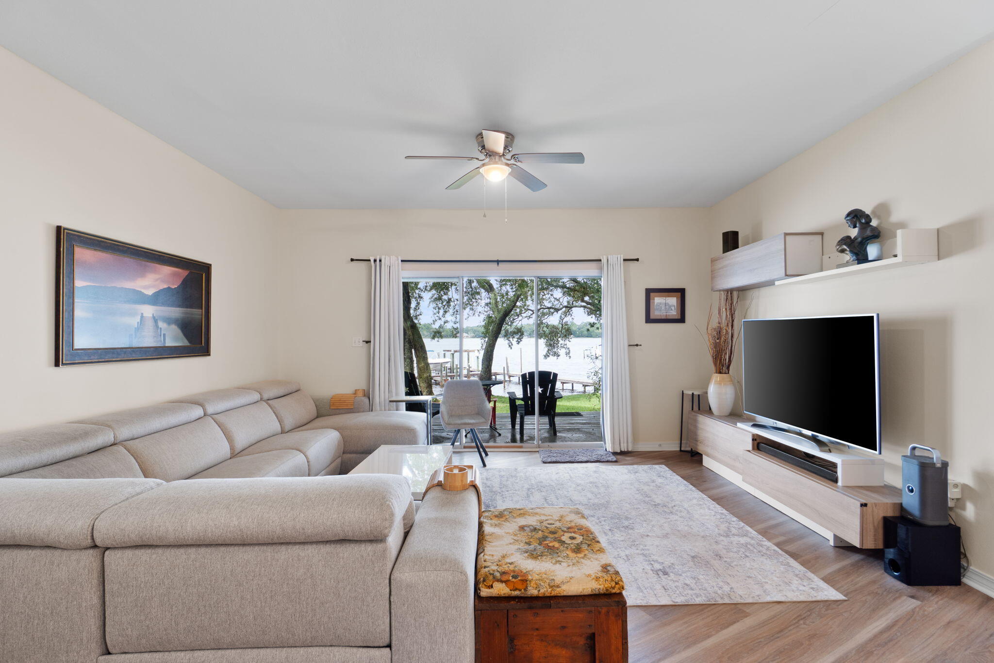 WATERFRONT + PRIVATE BOAT SLIP + UPDATED THROUGHOUT! This is the one for buyers who want the Navarre waterfront lifestyle without taking on a renovation project. 7208 Majestic Blvd has been refreshed from top to bottom with NO CARPET, fresh paint, updated flooring, fixtures and hardware--plus your own boat slip right outside.

If you've been looking for a Navarre townhome that offers more than just a place to live, 7208 Majestic Blvd deserves a closer look. This waterfront 3-bedroom, 2.5-bath townhome combines the convenience of low-maintenance living with the lifestyle benefits of direct water access and a private boat slip. Inside, the home has been updated throughout, creating a clean, cohesive feel without the hassle of taking on a renovation project after closing. You'll find newer flooring with NO CARPET, fresh interior paint, updated light fixtures, refreshed hardware, and thoughtful cosmetic improvements throughout. The open living area provides plenty of room to relax or entertain, while large windows bring in natural light and highlight the home's peaceful waterfront setting.
The kitchen flows naturally into the main living spaces, making everyday life easy and entertaining even better. Upstairs, the spacious primary suite and additional bedrooms provide flexibility for family, guests, a home office, or whatever your lifestyle requires. But the real differentiator is outside: step out and enjoy the water from your own backyard, with a private boat slip included. Spend your mornings on the water, keep the boat close by, or simply enjoy the added privacy and lifestyle that waterfront ownership provides.
Located in a desirable Navarre setting close to beaches, dining, shopping, and everyday conveniences, this is an opportunity to own a fully updated waterfront home with boating access at $449,000.
Skip the renovation list. Skip the search for a place to keep the boat. Come home to the water.