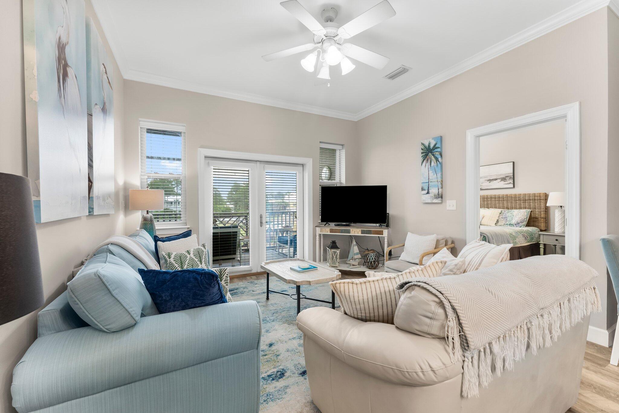 Located in Seagrove Highlands, a newer residential community in Seagrove Beach just off Scenic 30A, this updated three bedroom, two bathroom condo offers an easy coastal lifestyle with strong appeal as a full-time residence, second home, or investment opportunity.

The open-concept living area is designed for both comfort and functionality, featuring a recently updated kitchen and dining space. Double glass doors lead out to a screened porch overlooking the community greenery, creating a seamless indoor-outdoor setting that guests and owners alike can enjoy. The kitchen is finished with light-toned cabinetry, an eye-catching backsplash, stainless steel appliances, and a breakfast bar with seating for four.

The primary suite is conveniently located just off the living area and features... a spacious en suite bath with a double vanity, soaking tub, and separate shower. Two additional bedrooms share a full hallway bathroom, offering a practical layout for hosting family and guests.

Whether you are looking for a personal beach retreat or a property with income potential, this condo checks all the boxes in a highly sought-after 30A location.