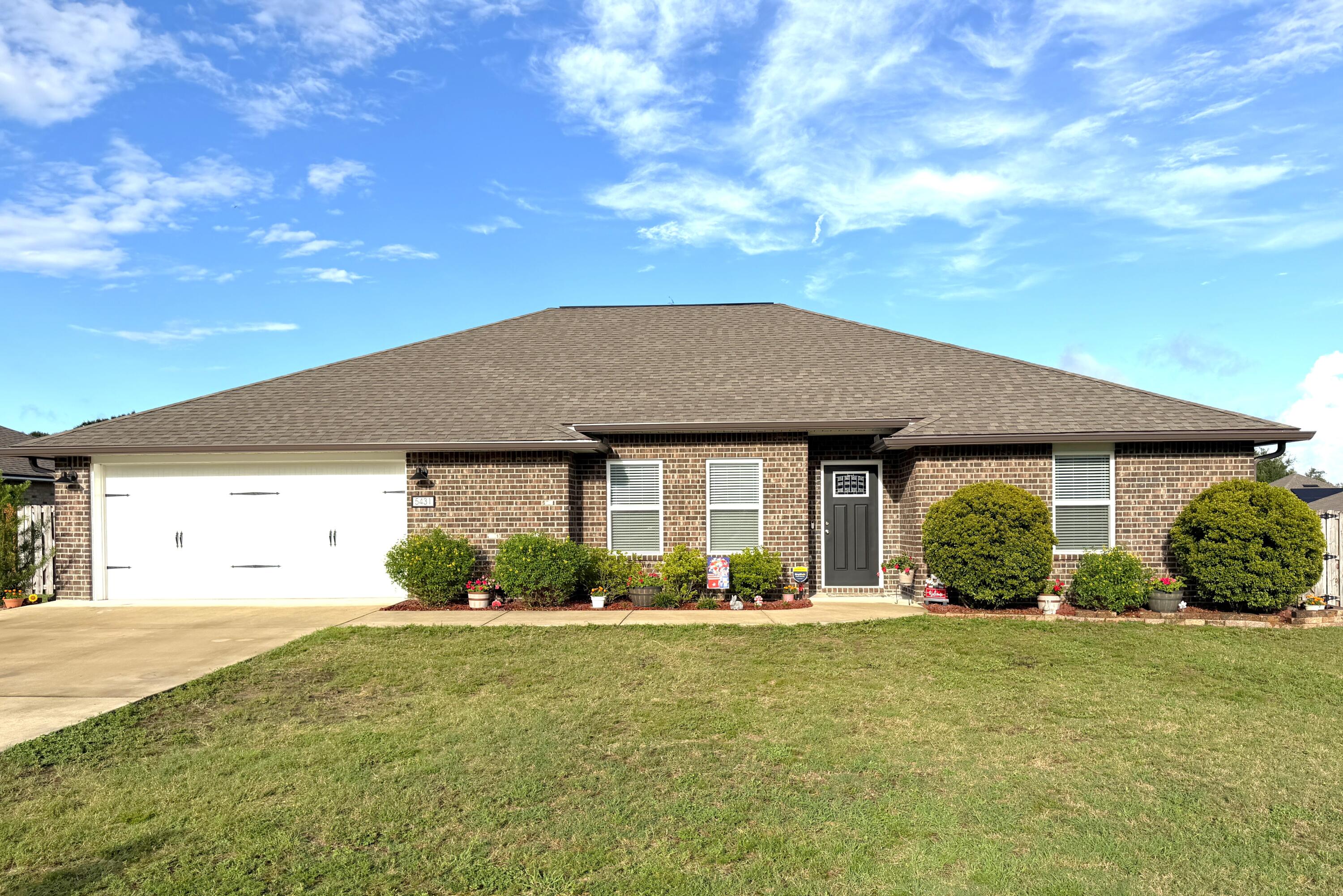 It's not every day a home this well maintained, this clean and this inviting, comes along. This beautiful 4 bedroom home in Lee Farms is a must see. It flows naturally from the formal dining area, through to the spacious living room, breakfast area and beautiful kitchen. It's mostly open, with just the right amount of separation to make the kitchen its own space. It features white Shaker cabinets, granite counter tops, newer stainless steel, upgraded appliances, nice pantry, built-in microwave and you can watch TV in the living room while working at the kitchen sink!  There's a gorgeous LVP in the main house and bathrooms with carpet in the bedrooms. The main suite has great space for all kinds of furniture or a sitting area and the main bathroom has double vanities with a makeup counter, a pretty oval tub/shower combo, water closet, and a spacious walk-in closet. The split bedroom floor plan allows for more privacy in the main suite. The garage was coated with a durable slip resistant coating that resists oil, abrasions, salt and tire wear. The privacy fenced back yard is a great space for different activities, room for play, gardening or pets. Seamless gutters have been installed, and this home is in tip-top shape. It's priced to sell and ready for another buyer to call it home!