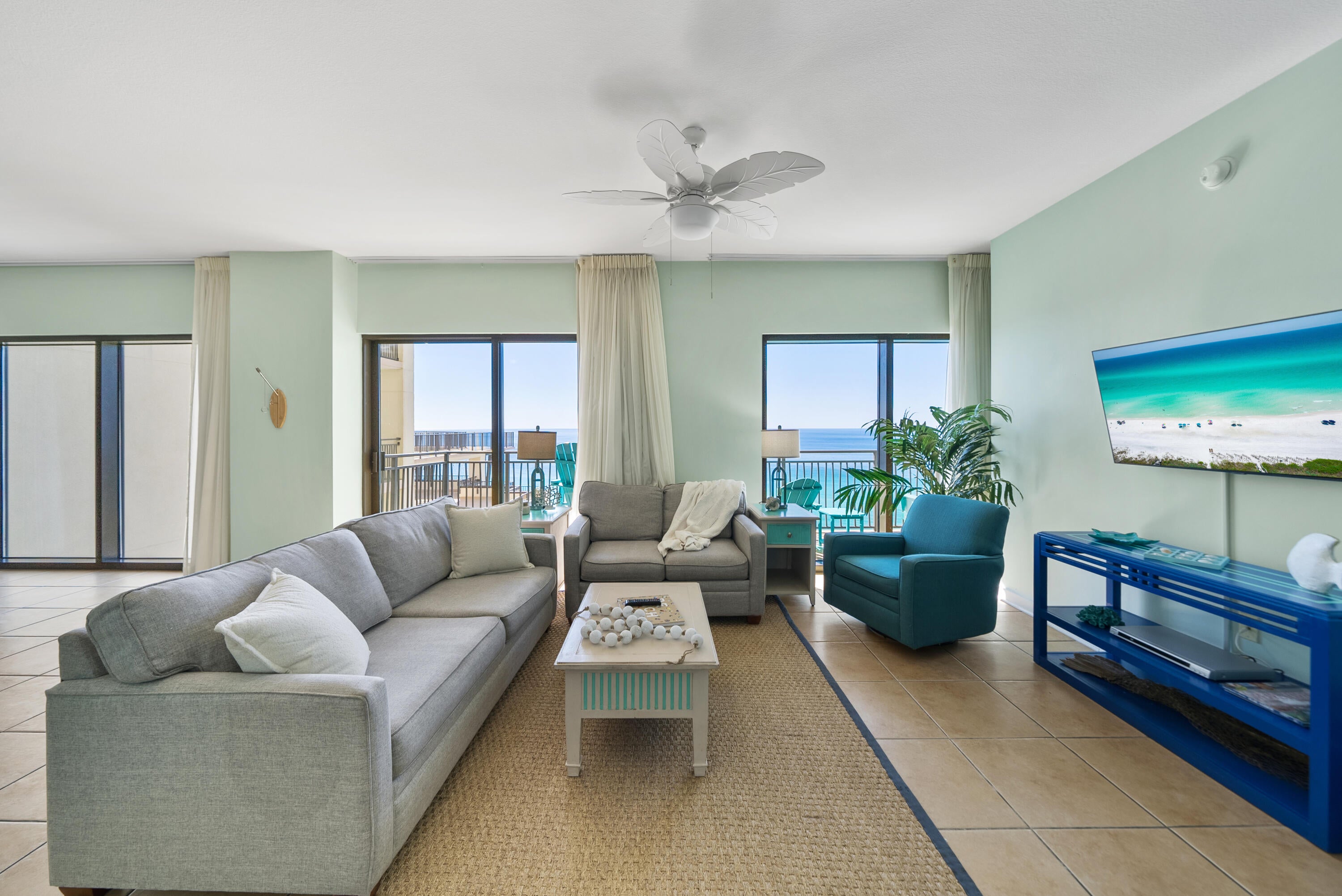 Rare income-producing opportunity in one of Panama City Beach's most in-demand buildings - now with a $30K price improvement. Unit 1604 at Origin at Seahaven is a true 16th-floor penthouse with a private rooftop-style balcony delivering unobstructed 180-degree Gulf views -- sugar-white sand, turquoise water, Pier Park, and West Bay, all from one of the highest vantage points on the beach. This is the kind of view that commands premium nightly rates and books out fast: sunrise coffee, sunset cocktails, and front-row seats to multiple fireworks shows all summer long, no ticket required. Inside, a wall of Gulf-facing windows floods the living room and kitchen with light and unobstructed water views -- the exact feature that drives booking conversions and 5-star reviews for short-term rental guests. The split floor plan offers two primary suites, each with its own en-suite bath and walk-in closet, plus a third guest bedroom and full bath across the hall -- a layout built for multi-family or multi-group bookings, maximizing revenue per stay. Generous living and dining space accommodates large gatherings, another key driver for premium STR pricing. For the investor thinking bigger: adjoining Unit 1602, a lockout unit, can also be available for purchase -- creating a rare 6-bedroom penthouse combination with the flexibility to book as one expansive luxury unit or split for dual-income streams. This amenity-rich condo community offers owners and guests a Grand Pool Terrace with a Gulf-view pool deck with heated whirlpool/hot tub, movie theater with stadium seating (24 seats), arcade, and volleyball courts, along with a state-of-the-art fitness center with cardio and free weights. Located one mile from Pier Park and kids eat free at Sharky's - an on-site/nearby restaurant partner located directly across the street. Whether held as a high-performing short-term rental, a lock-and-leave second home with income potential, or paired with Unit 1602 for a one-of-a-kind investment package, this 16th floor penthouse delivers the location, layout, and views that keep renters coming back year after year. Rental actuals and projections available upon request. Buyer to verify all dimensions.