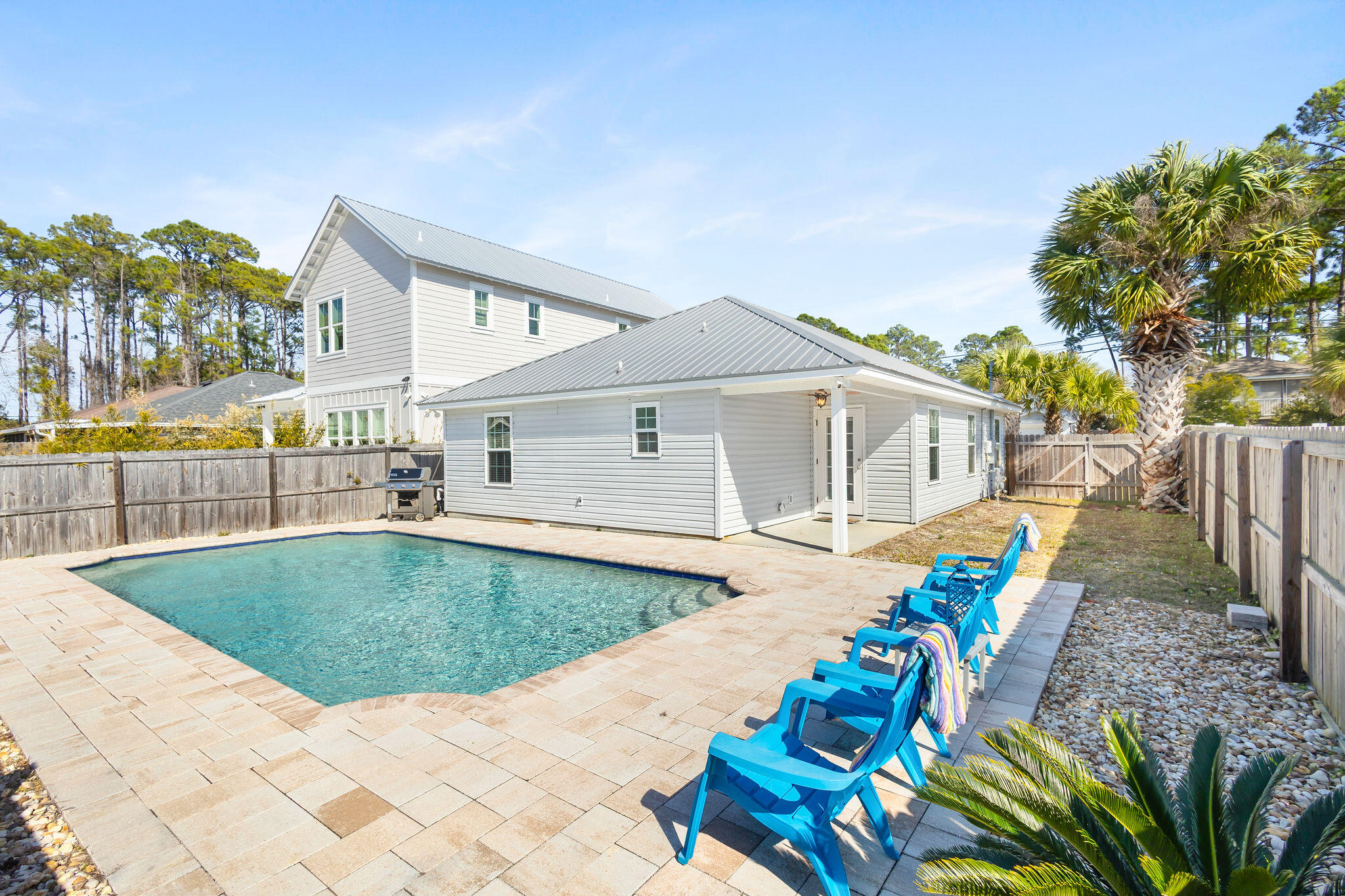 This well-located 3-bedroom, 2-bathroom home on the highly desirable west end of Panama City Beach features an oversized private pool and no HOA. Short-term rentals are allowed, making this a fantastic investment or second home opportunity. Located just minutes from all that Highway 30A has to offer and within a short walk to the white sandy beaches and emerald waters of the Gulf of Mexico. This is a must-see coastal property!