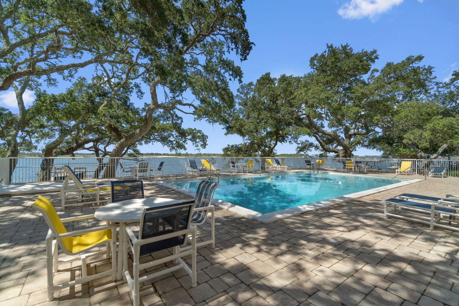 Short-term rentals are permitted! The Cedars is a waterfront condo complex perfectly situated near Emerald Coast beaches and offers easy access to Hurlburt Field, Eglin AFB, shopping, dining, and entertainment. Amenities include a waterfront pool, dock, picnic area, community room, laundry facilities, elevators, and a kayak rack with complimentary storage.