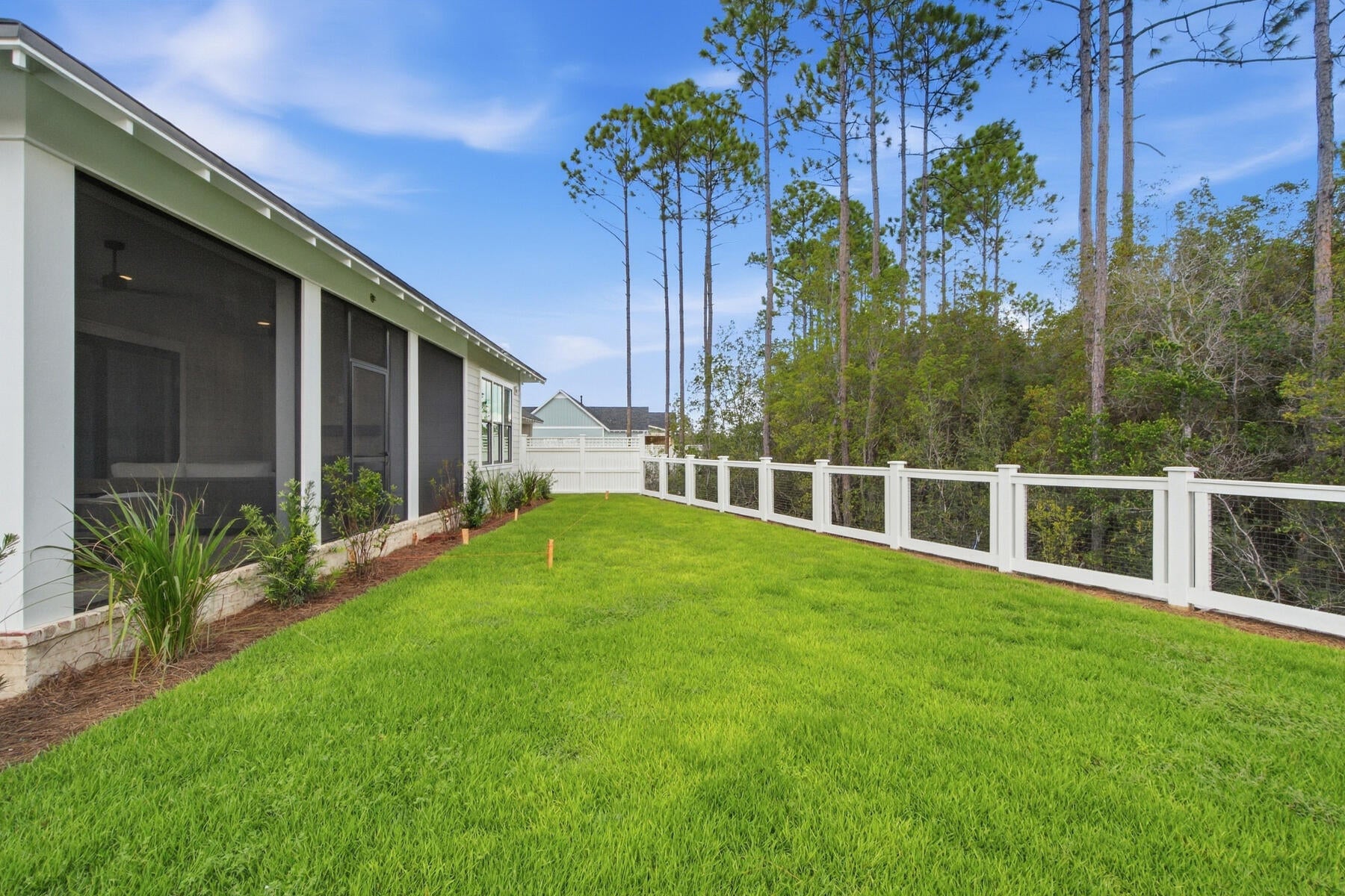 *Move-In Ready! 
Welcome to the Sydney plan, part of the Preserve Collection in the Arborview Park neighborhood of Watersound Origins. Positioned on a deep homesite exceeding 150 feet with a wooded view, this thoughtfully designed single-level home offers 4 bedrooms, 3 bathrooms, and a 2-car garage.

The open living, dining, and kitchen areas create a spacious central gathering space, highlighted by 16-foot sliding glass doors in the living room that open to a 12' x 24' screened rear porch with a gas fireplace, seamlessly connecting indoor and outdoor living.

The kitchen is designed for both function and style with quartz countertops, upgraded cabinet panel front Wolf appliance package, a expanded island with extra cabinets, and stacked glass upper cabinets that add visual interest and additional storage.

The primary suite is privately positioned and features a well-appointed bath with a freestanding soaking tub, tiled shower, dual vanities, and a large walk-in closet. Each of the guest bedrooms includes generous walk-in closets, offering excellent storage throughout the home. Additional upgrades include pre-wiring and a gas stub for a future generator, plumbing for a water filtration system, shiplap in the foyer, along hallway leading to garage and on kitchen island, solid core doors throughout, extra cabinets and basin sink in the laundry room, upgraded Seaside Limestone tile in bathrooms, dry bar with cabinet panel front Scotsman nugget ice machine and SubZero beverage center, epoxy garage floor and EV car charger.

Homes in the Preserve Collection benefit from larger homesites that provide additional privacy and flexibility for outdoor living, including the opportunity to add a pool.

Estimated completion: end-July 2026

As part of Watersound Origins, often called "A Coastal Village," residents relish abundant amenities like the Village Commons resort-style pool, fitness center, sports courts, miles of nature trails, event lawns, and the Origins Golf Course. Surrounded by towering pines and just minutes from Lake Powell and the beaches of Scenic Highway 30A, this community blends natural beauty with easy access to Inlet Beach, Grayton Beach, and beyond. Upcoming highlights include the 15.5-acre Longleaf Art Park, opening in 2027, featuring cultural and recreational experiences.