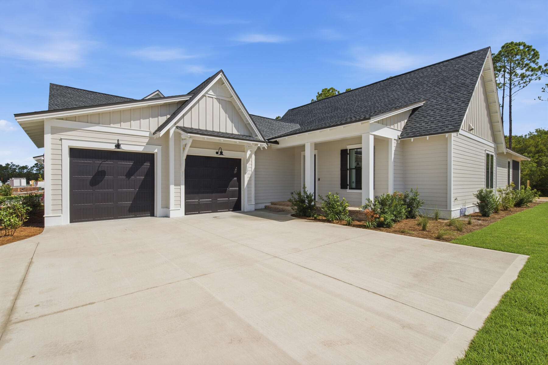 Welcome to the Sydney plan, part of the Preserve Collection in the Arborview Park neighborhood of Watersound Origins. Positioned on a deep homesite exceeding 150 feet with a wooded view, this thoughtfully designed single-level home offers 4 bedrooms, 3 bathrooms, and a 2-car garage.

The open living, dining, and kitchen areas create a spacious central gathering space, highlighted by 16-foot sliding glass doors in the living room that open to a 12' x 24' screened rear porch with a gas fireplace, seamlessly connecting indoor and outdoor living.

The kitchen is designed for both function and style with quartz countertops, upgraded cabinet panel front Wolf appliance package, a expanded island with extra cabinets, and stacked glass upper cabinets that add visual interest and additional storage.

The primary suite is privately positioned and features a well-appointed bath with a freestanding soaking tub, tiled shower, dual vanities, and a large walk-in closet. Each of the guest bedrooms includes generous walk-in closets, offering excellent storage throughout the home. Additional upgrades include pre-wiring and a gas stub for a future generator, plumbing for a water filtration system, shiplap in the foyer, along hallway leading to garage and on kitchen island, solid core doors throughout, extra cabinets and basin sink in the laundry room, upgraded Seaside Limestone tile in bathrooms, dry bar with cabinet panel front Scotsman nugget ice machine and SubZero beverage center, epoxy garage floor and EV car charger.

Homes in the Preserve Collection benefit from larger homesites that provide additional privacy and flexibility for outdoor living, including the opportunity to add a pool.

Estimated completion: end-July 2026

As part of Watersound Origins, often called "A Coastal Village," residents relish abundant amenities like the Village Commons resort-style pool, fitness center, sports courts, miles of nature trails, event lawns, and the Origins Golf Course. Surrounded by towering pines and just minutes from Lake Powell and the beaches of Scenic Highway 30A, this community blends natural beauty with easy access to Inlet Beach, Grayton Beach, and beyond. Upcoming highlights include the 15.5-acre Longleaf Art Park, opening in 2027, featuring cultural and recreational experiences.