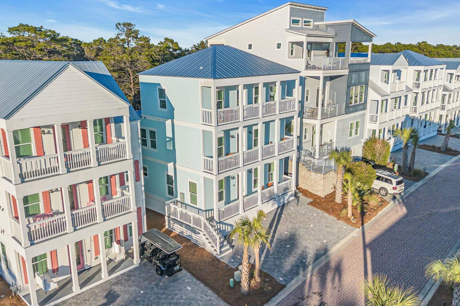Located in the vibrant coastal community of Serenity at Dune Allen, this beautifully appointed home backs to a tranquil conservation area, offering exceptional privacy and a serene natural backdrop. Fully furnished with an elevated luxury coastal design, the interior features 10-ft ceilings, LVP flooring throughout, and a conveniently located first-floor master suite. The kitchen is outfitted with high-end appliances, abundant cabinet space, quartz countertops, and a spacious island with breakfast bar seating. The first floor also includes a half bath for added convenience.

Both the first- and second-floor full bathrooms showcase custom-tiled showers with frameless glass doors, tile flooring, and quartz countertops. Exterior upgrades include HardiBoard siding, a metal roof, a screened porch, and an outdoor shower, perfect after a day at the beach. The home is being sold fully furnished, including flat-screen TVs, kitchenware, and small appliances.
The second-floor features two spacious king bedrooms, including one with direct access to a full balcony, as well as two built-in hallway bunk beds. The third floor offers a large loft with access to another full balcony, a wet/coffee bar, a full bathroom, and an additional bunk room. Every level of the home boasts its own balcony with beautiful views and refreshing breezes.
 With the newer Dune Allen County Beach Access only a short distance away, this home delivers the true coastal experience whether you're seeking a peaceful primary residence, a stylish second-home retreat, or a high-demand rental.