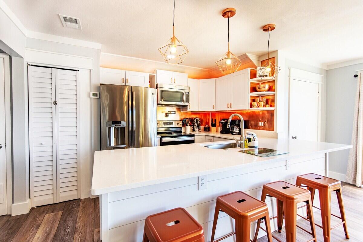 Welcome to Copper Cay -- a stylish coastal retreat in the heart of Destin! Perfectly positioned for easy access to everything the Emerald Coast is known for, this beautifully updated condo places you just minutes from deep sea fishing, Crab Island, sugar-white sand beaches, waterfront dining, shopping, and entertainment. Whether you're looking for a full-time residence, vacation getaway, or investment opportunity, this location delivers the ultimate Destin lifestyle.

This spacious 1-bedroom, 1-bath condo offers approximately 800 square feet of comfortable living, blending industrial farmhouse charm with warm copper accents for a unique and inviting feel. Inside, you'll find an updated kitchen with granite countertops, newer appliances, and hardwood flooring throughout. The open layout creates a cozy yet functional space, and the convenience of your own private washer and dryer makes everyday living easy. Best of all, all appliances convey for a move-in-ready opportunity.

The community offers resort-style amenities including 3 pools (one conveniently located right next to the building), tennis courts, outdoor grilling areas, a community room, and a peaceful lake walkover just steps away.

Whether you're searching for a low-maintenance beachside escape or a smart investment in one of Destin's most desirable areas, Copper Cay offers the perfect blend of comfort, charm, and coastal convenience.