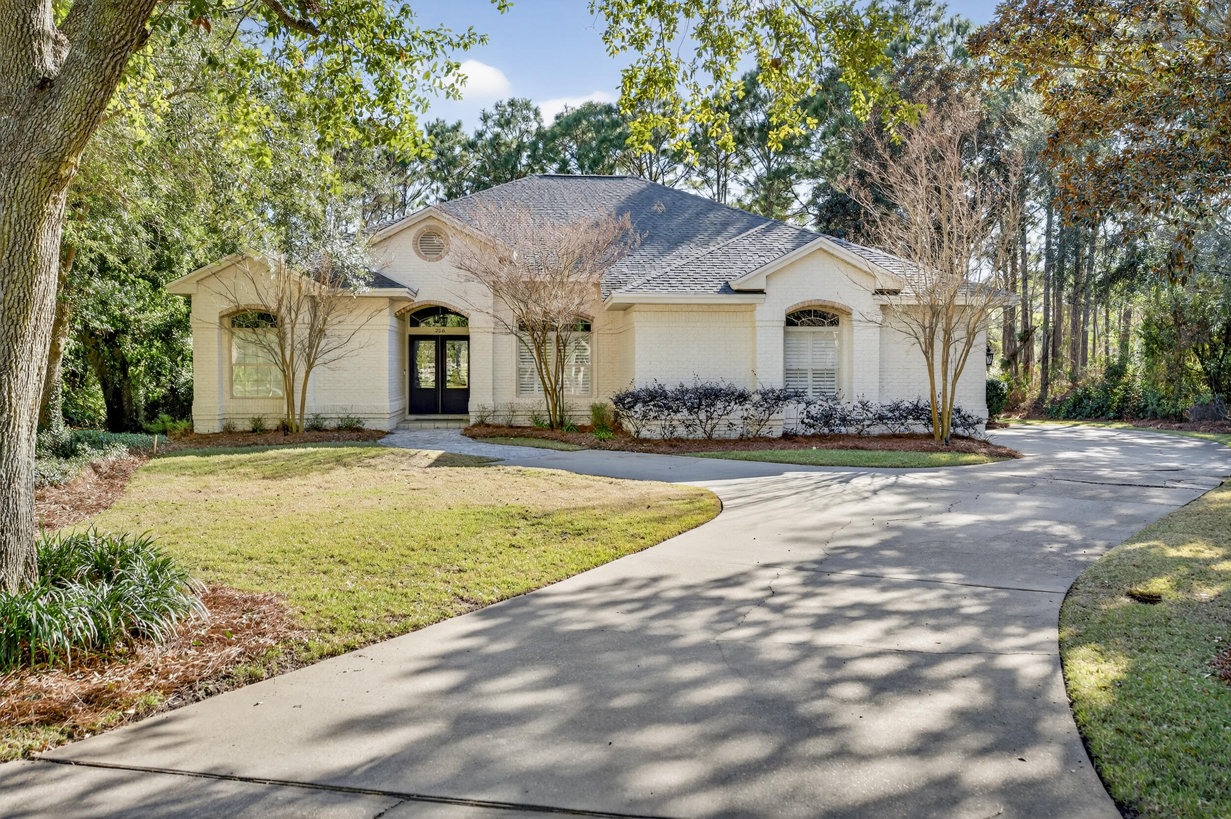 UNDER CONTRACT - ACCEPTING BACKUP OFFERS. Positioned on a private cul-de-sac within the gated community of Kelly Plantation, this 4 bedroom + office, 3 bath residence offers a refined split floor plan with timeless upgrades throughout.

The kitchen anchors the home with stone countertops, a custom island, and premium appliances including 66-inch dual column refrigeration and a five-burner gas range. Two living areas and a dedicated office provide flexibility, while expansive sliding doors bring in natural light and connect seamlessly to the outdoors. The primary suite features a spa-style bath with a freestanding soaking tub and oversized glass shower.

Outdoor living includes a covered lanai, screened pool with glass safety divider, extended lounging areas, and a private wooded backdrop with a paver fire pit. A mosquito misting system enhances comfort year-round. 

Additional highlights include heated/cooled 3 car garage with storage system and epoxy flooring and a whole home generator. Recent improvements include New Roof (2021), Rinnai Tankless Water Heater (2022), New Electrical Panel (2021), Pool Enclosure Rescreened (2022), New Pool Filter (2024), New Pool Heater (2025), full list available upon request. 

Residents enjoy resort-style amenities including a championship golf course, tennis, equestrian center, community pool, fitness, trails, and owner's clubhouse, all just minutes from the beaches, dining, and boating of Destin.