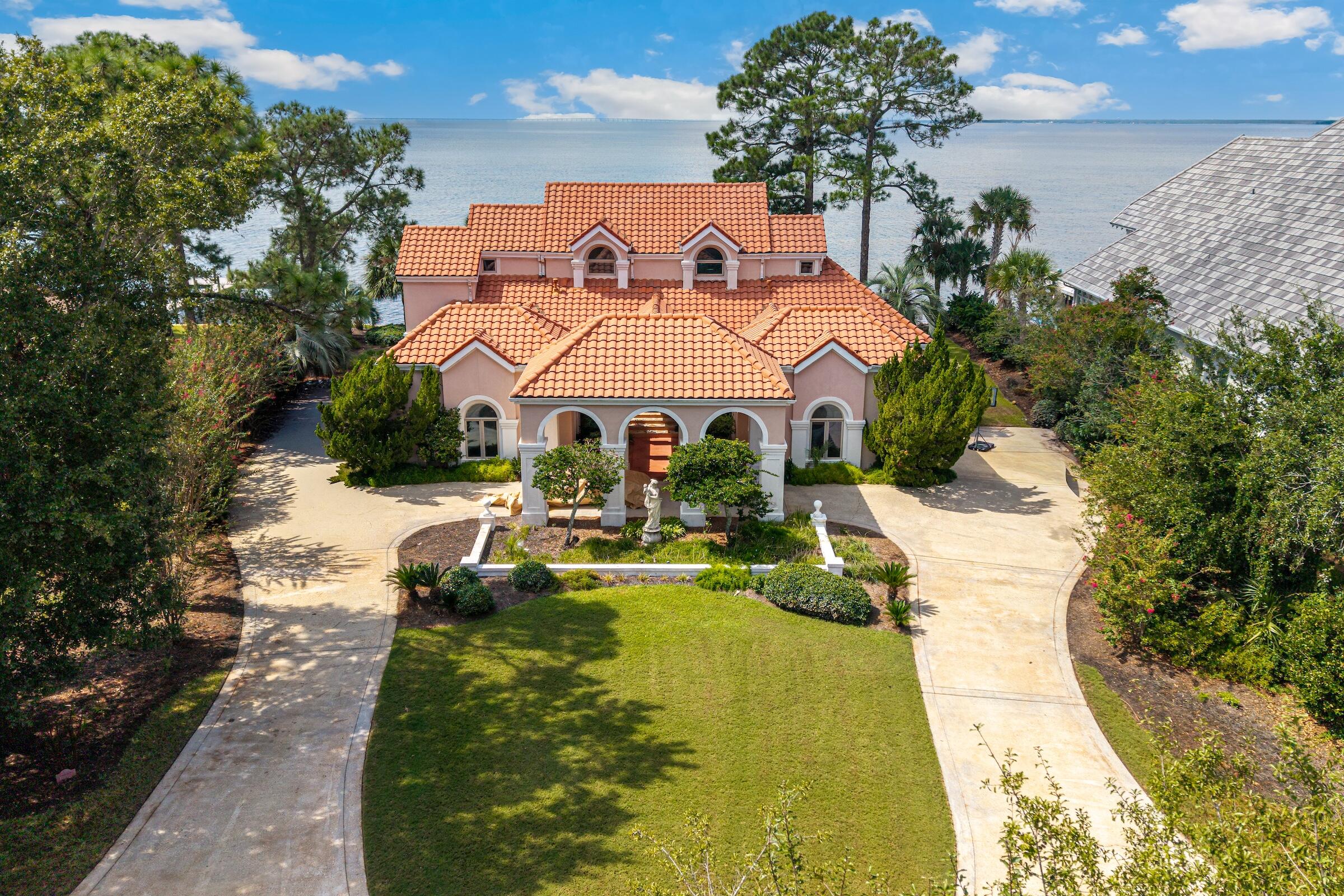 A rare opportunity to own an exceptional bayfront property within Sandestin Golf and Beach Resort. Positioned along the shores of Choctawhatchee Bay, the property offers expansive water views and a desirable western exposure for spectacular sunsets. An existing residence provides the next owner with the opportunity to undertake a substantial renovation or reimagine the property to create a custom bayfront retreat. Located in the sought-after Bay Estates neighborhood, this peaceful setting also provides convenient access to Sandestin's golf, dining, shopping, and resort amenities.