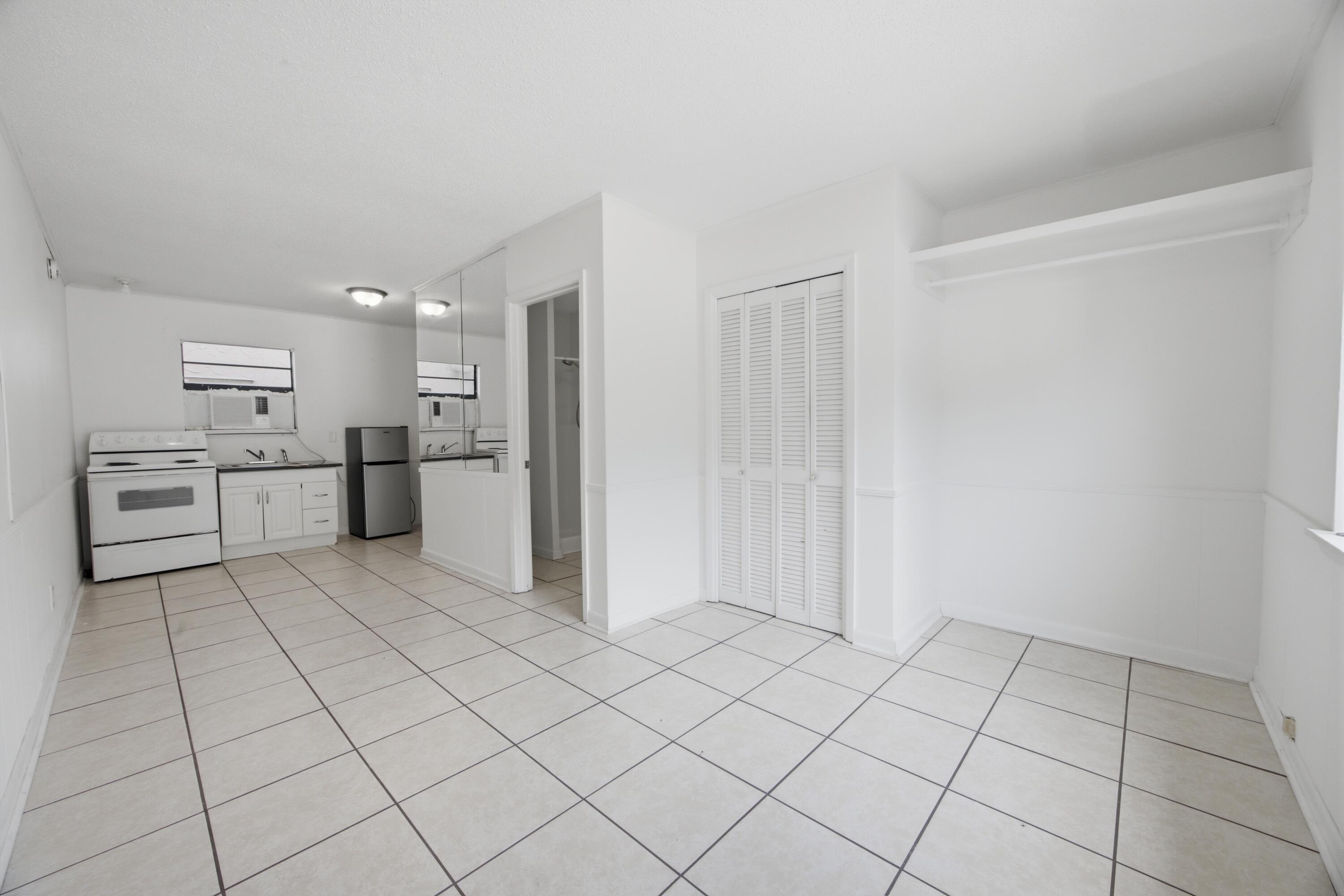 PORT DIXIE BEG NE COR BLK 56 S 164.67 FT - Residential