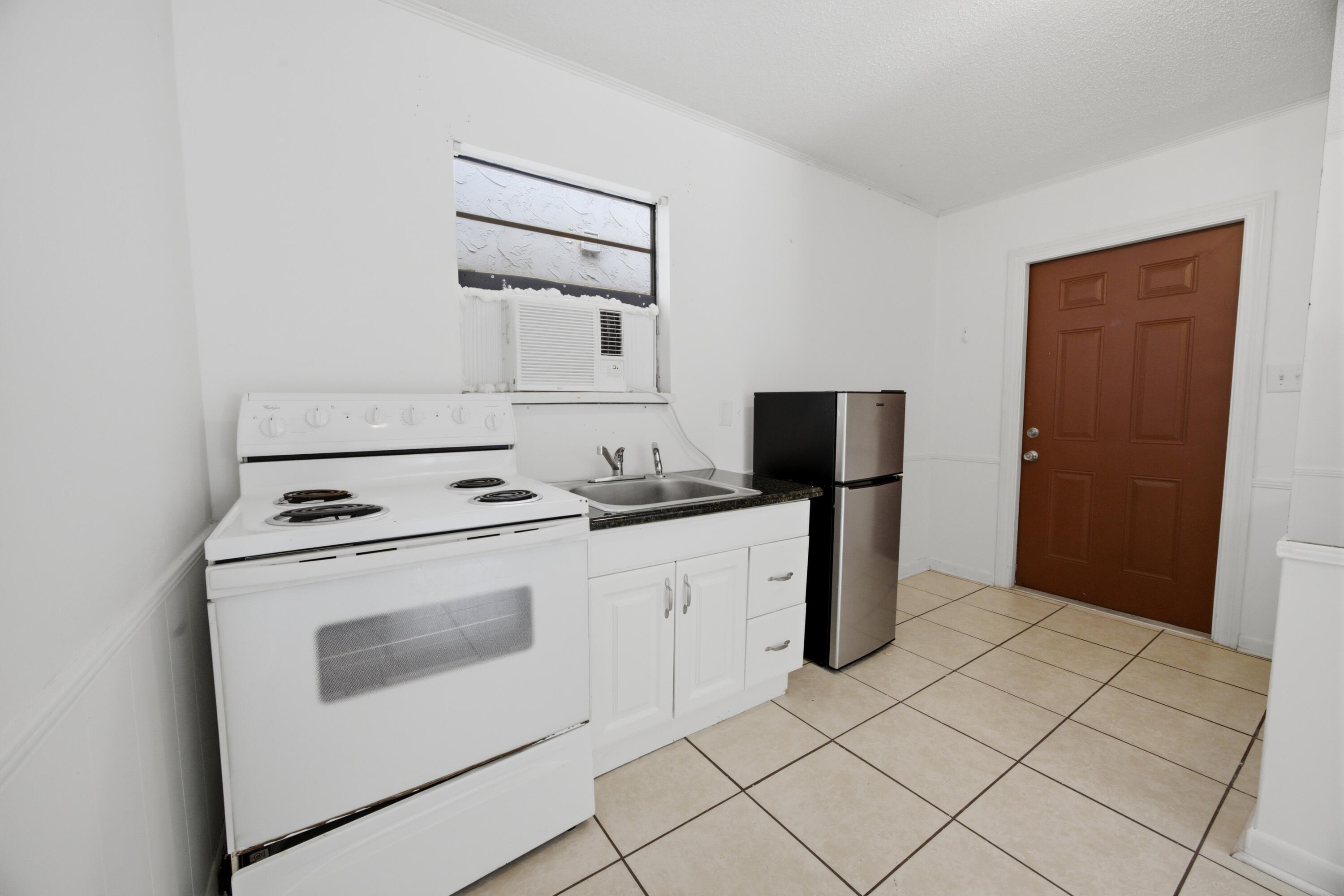 PORT DIXIE BEG NE COR BLK 56 S 164.67 FT - Residential