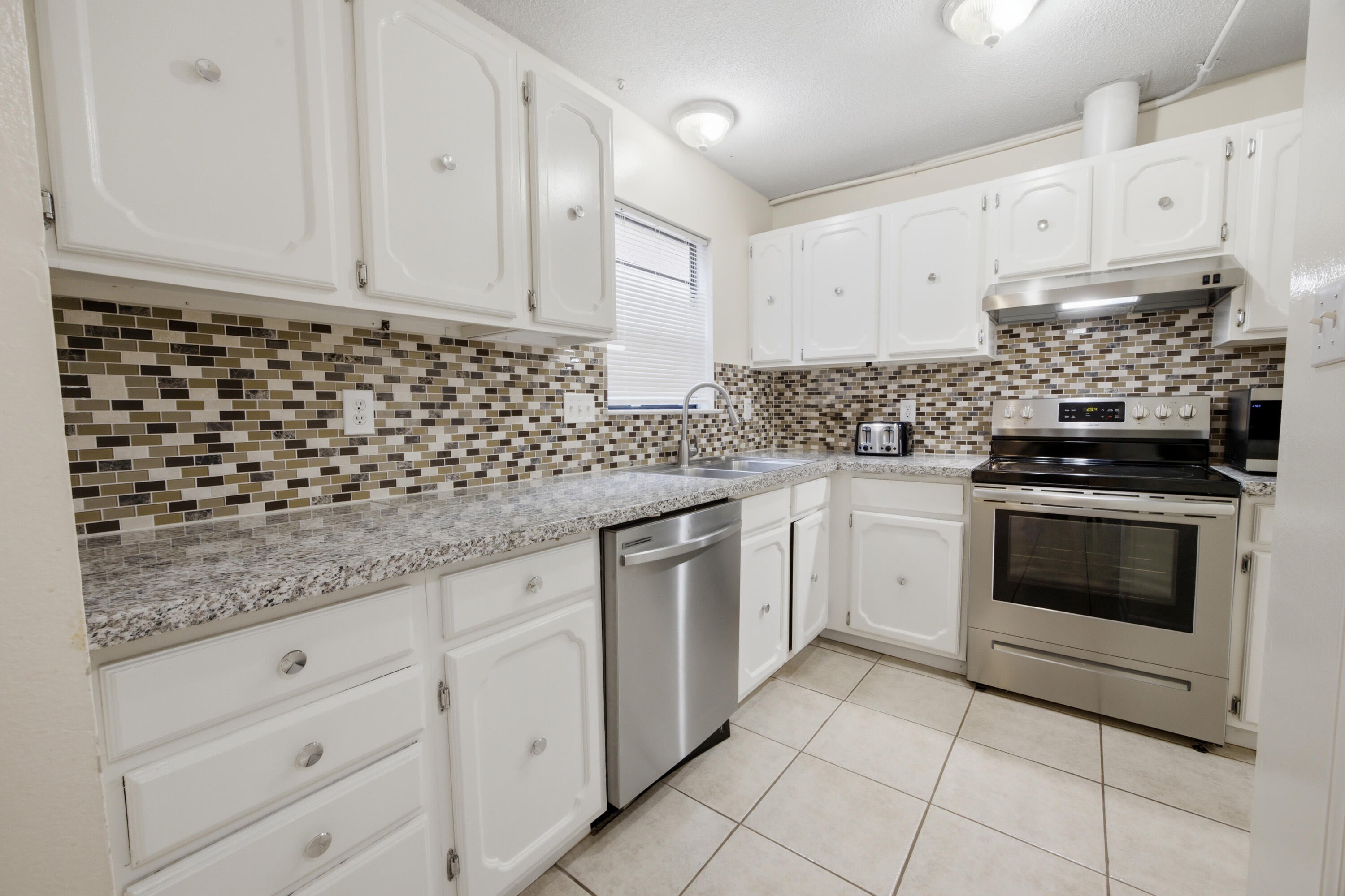 PORT DIXIE BEG NE COR BLK 56 S 164.67 FT - Residential