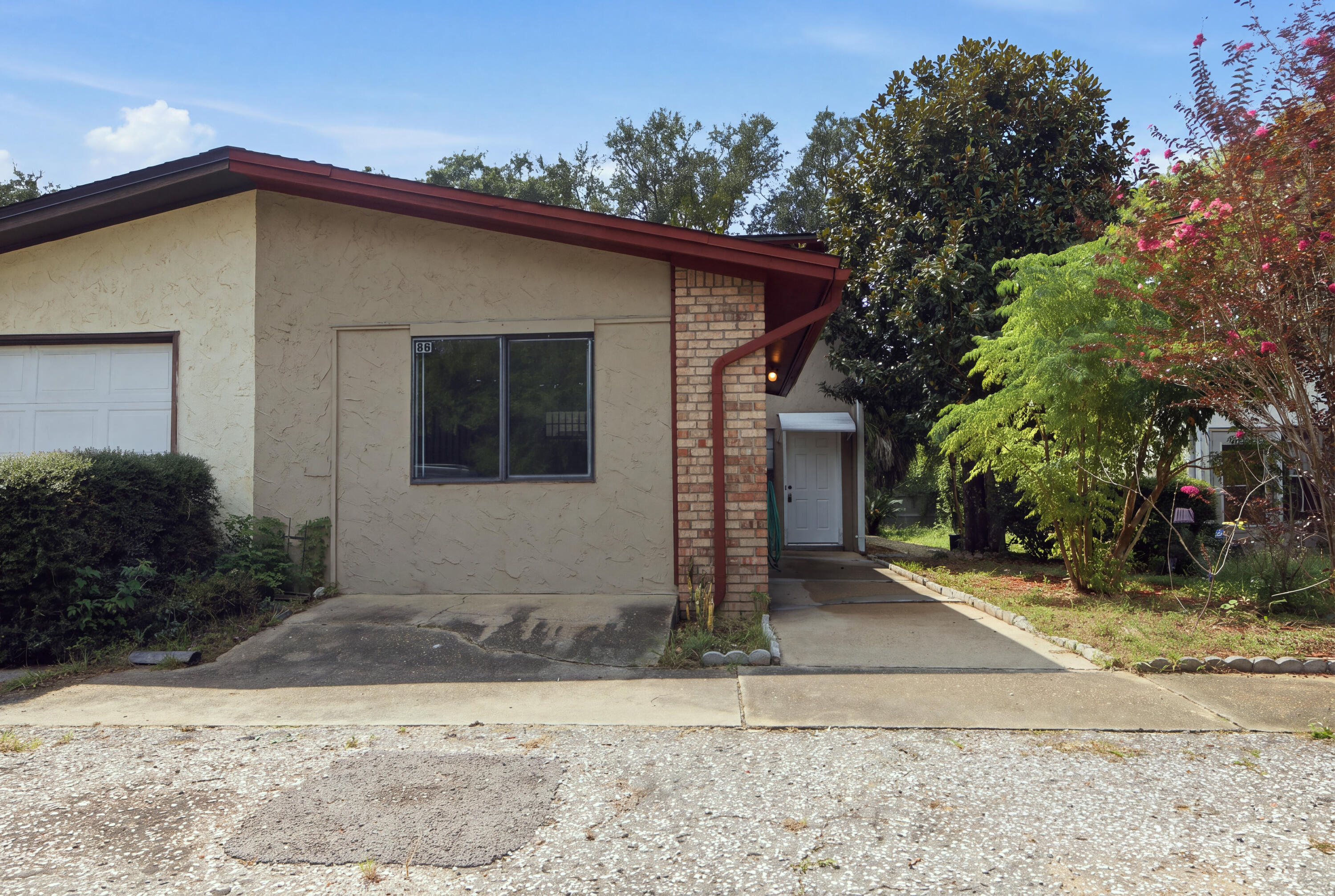**ASSUMABLE FHA LOAN**

Imagine having a home where everyone has room to be together and still have enough space to spread out when they need it.... 

This Shalimar townhome offers a total of 4 bedrooms, 4 bathrooms, and approximately 1,990 SF in a versatile layout that can grow with you! 

The converted garage studio is a true bonus, complete with its own private bathroom and kitchenette. Use it for visiting family or friends, multigenerational living, a private workspace, or explore its potential for additional rental income. 

Inside the main home, it features an updated kitchen with granite countertops, tile backsplash, stainless steel appliances, and two pantries, perfect for families who need the storage!

Upstairs you'll find a spacious primary suite with a private bathroom, the other two bedrooms, and a Florida room for those cool mornings to drink your coffee and enjoy the sounds of the birds in the trees. 

Out back enjoy beautiful landscaping, a large covered patio, and brick-paver patio perfect for family dinners and entertaining. 

Ease your mind with knowing all the major appliances have been taken care of! Hot Water Heater replaced in 2022, Roof installed in 2020 and the HVAC from 2016. 

Convenient to Eglin AFB, Fort Walton Beach, top-rated schools, shopping, dining, and the Emerald Coast! This home brings more than just extra space, it gives you flexibility for whatever life brings next