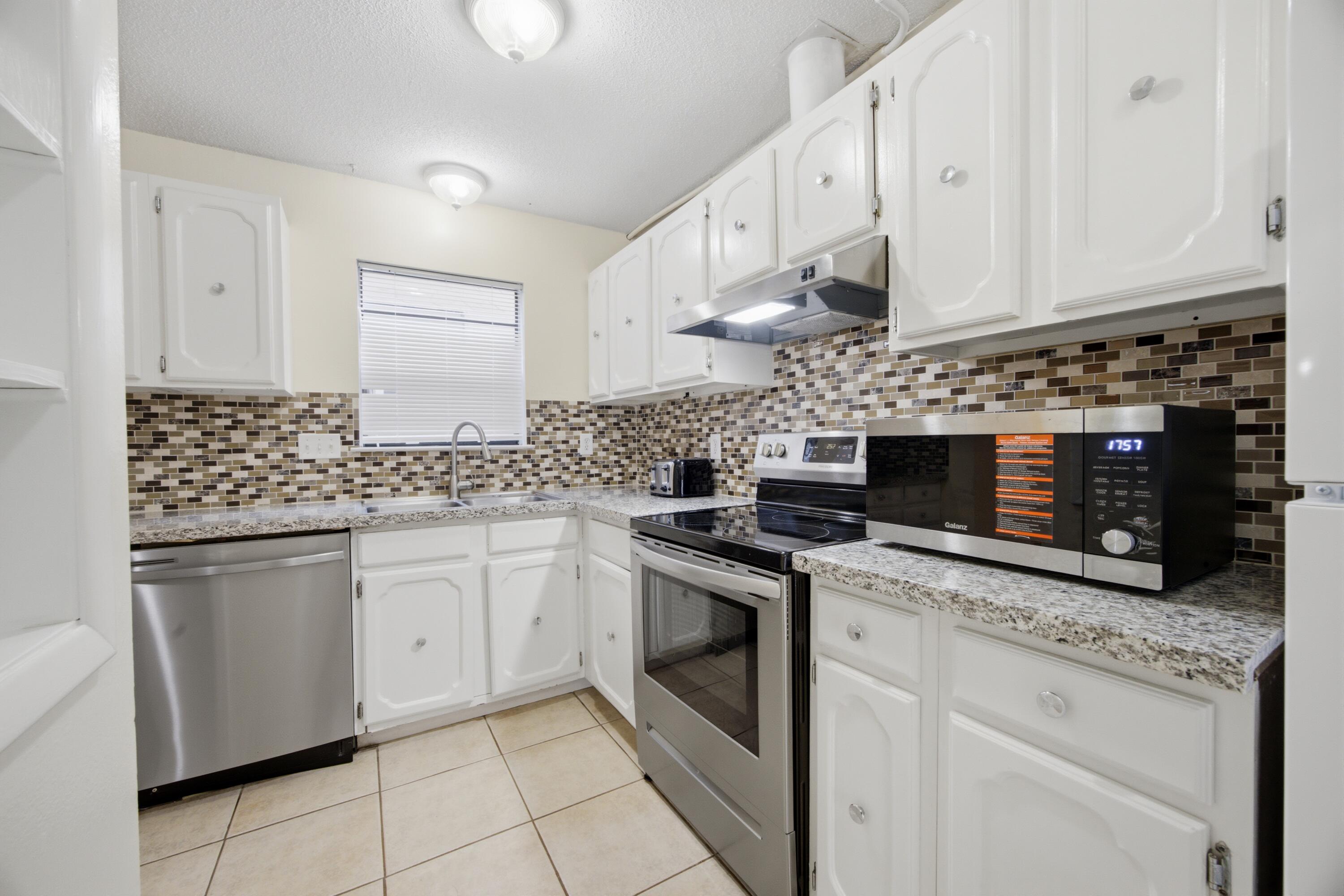 PORT DIXIE BEG NE COR BLK 56 S 164.67 FT - Residential