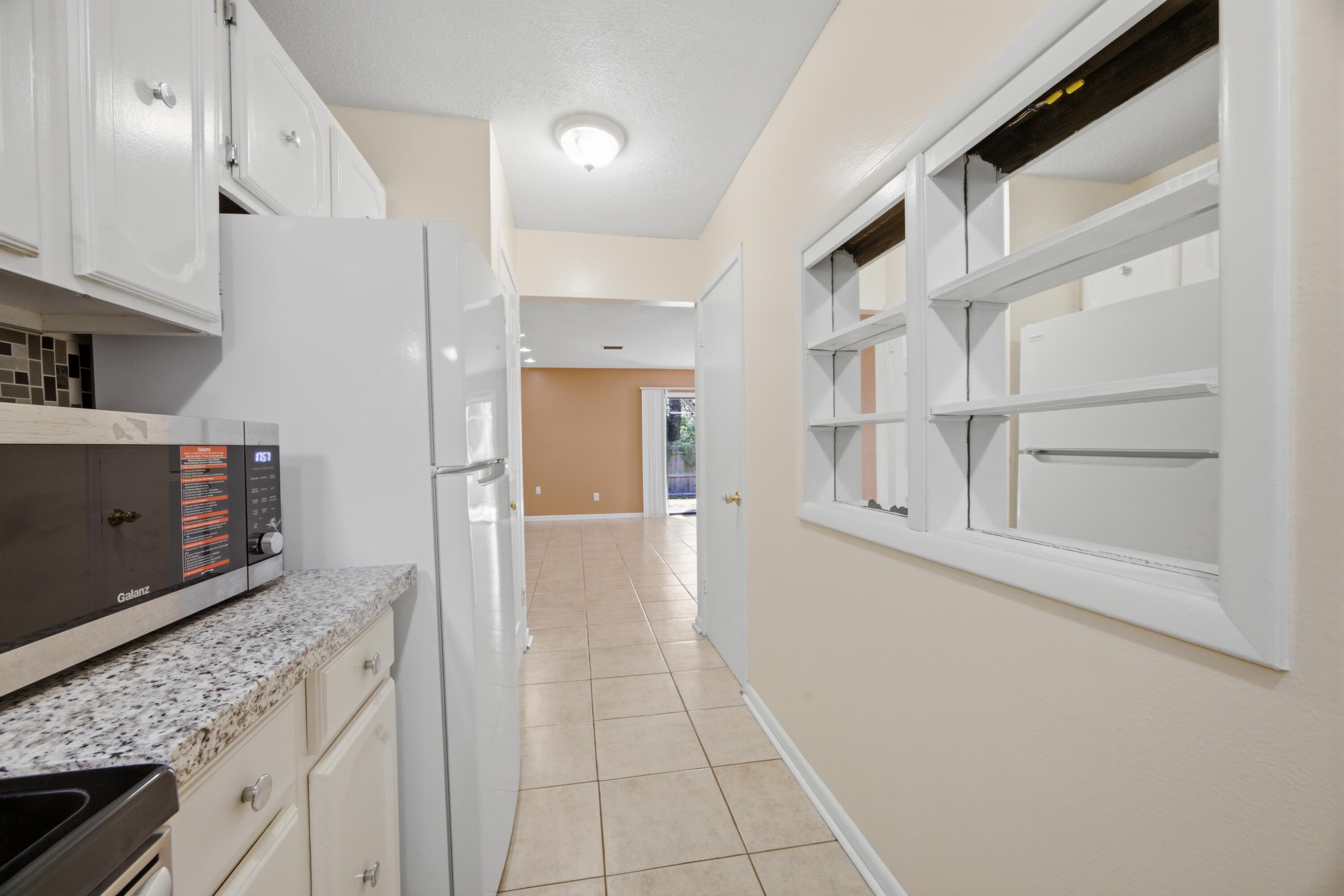PORT DIXIE BEG NE COR BLK 56 S 164.67 FT - Residential