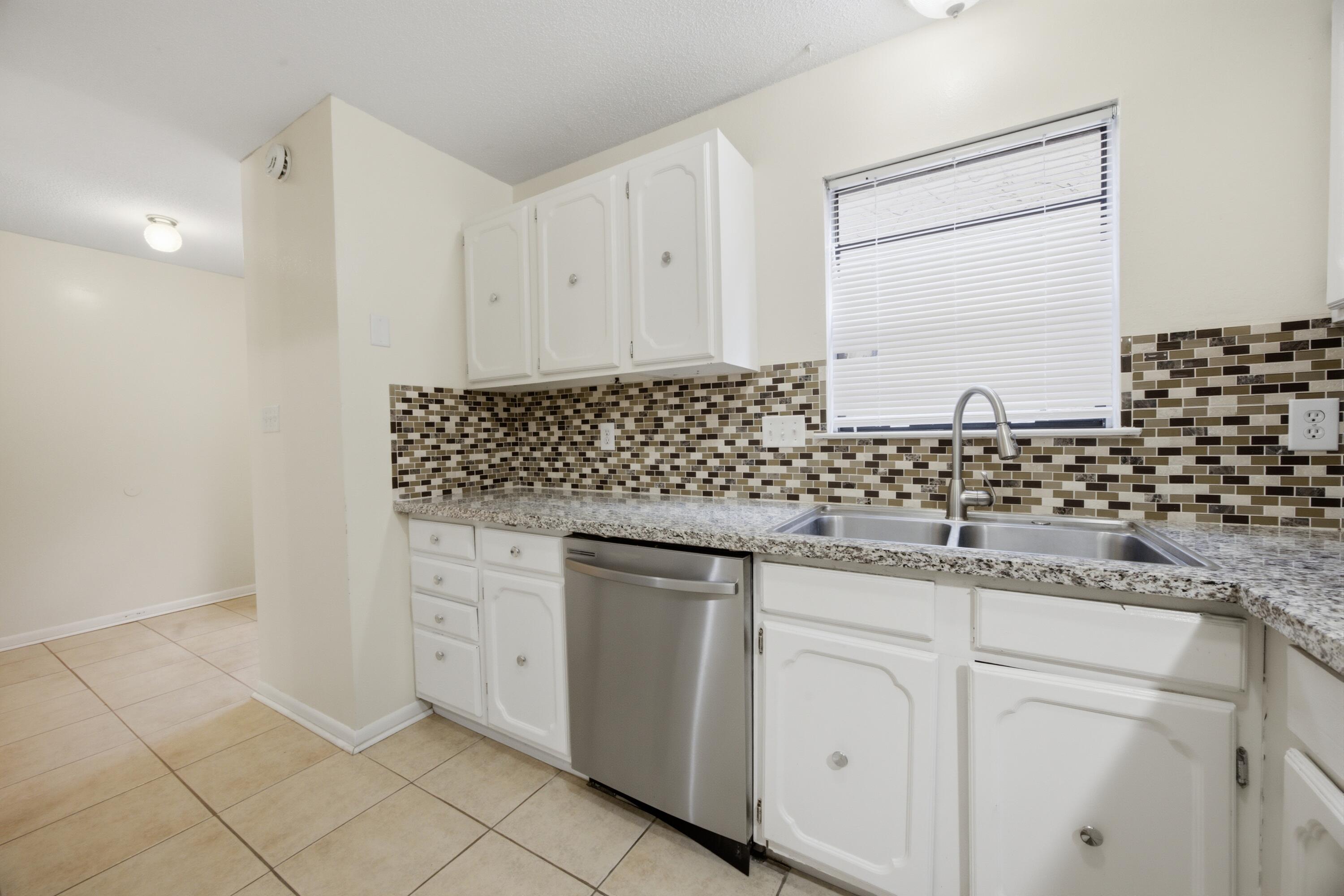 PORT DIXIE BEG NE COR BLK 56 S 164.67 FT - Residential