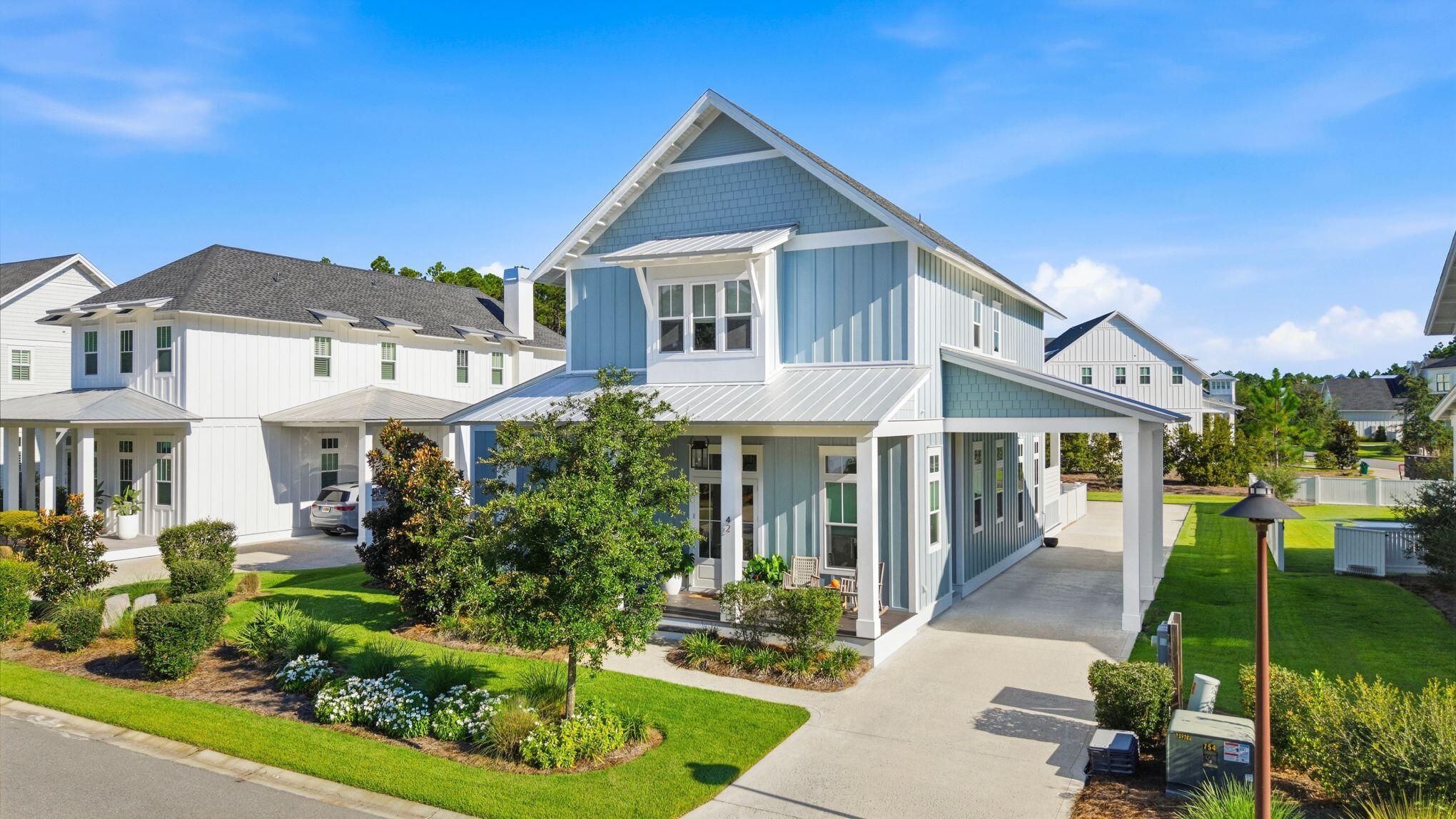 Welcome to Watersound Origins--The Greenway Gathering. Set in the most sought-after Origins community Greenway, an intimate enclave of just 62 homes, this property offers 3,517 SF including a 2,945-SF 4BR/4.5BA main home + 572-SF 1BR/1BA carriage apartment with living room, kitchenette & balcony all above the rear loaded 2-car garage. Florida living takes center stage with a HUGE 648-SF screened porch featuring summer kitchen, dining & 2 sitting areas overlooking the pool & spa. The spacious primary opens directly to the porch. Inside, enjoy a rare kitchen island + peninsula seating arrangement & wet bar ideally positioned between kitchen, dining & living. Upstairs: 3 ensuites--2 with primary-size bedrooms--+ bonus den/office. As an added convenience, a Portico w/entry to kitchen/mudroom. Greenway is surrounded by protected forest & just 1 minute from Hwy 98 & Village Commons--the heart of Origins' main amenities: fitness, pool, pickle ball & Par-3 golf course + mor. Trails connect directly to the Town Center, while the Lake Powell dock is a 5-minute bike ride. Origins is only 1-mile north of 30A's sugar-white beaches--close enough to enjoy, but far enough to get away. As a MAJOR bonus, the optional Watersound Club Lifestyle Membership is literally a 10-min bike ride at Camp Creek. The club membership offers 3 private golf courses, beach club & so much more are all within 10-minute car ride. You better hurry though, by Dec 11, 2026, the initiation fee rises from $75k to $125