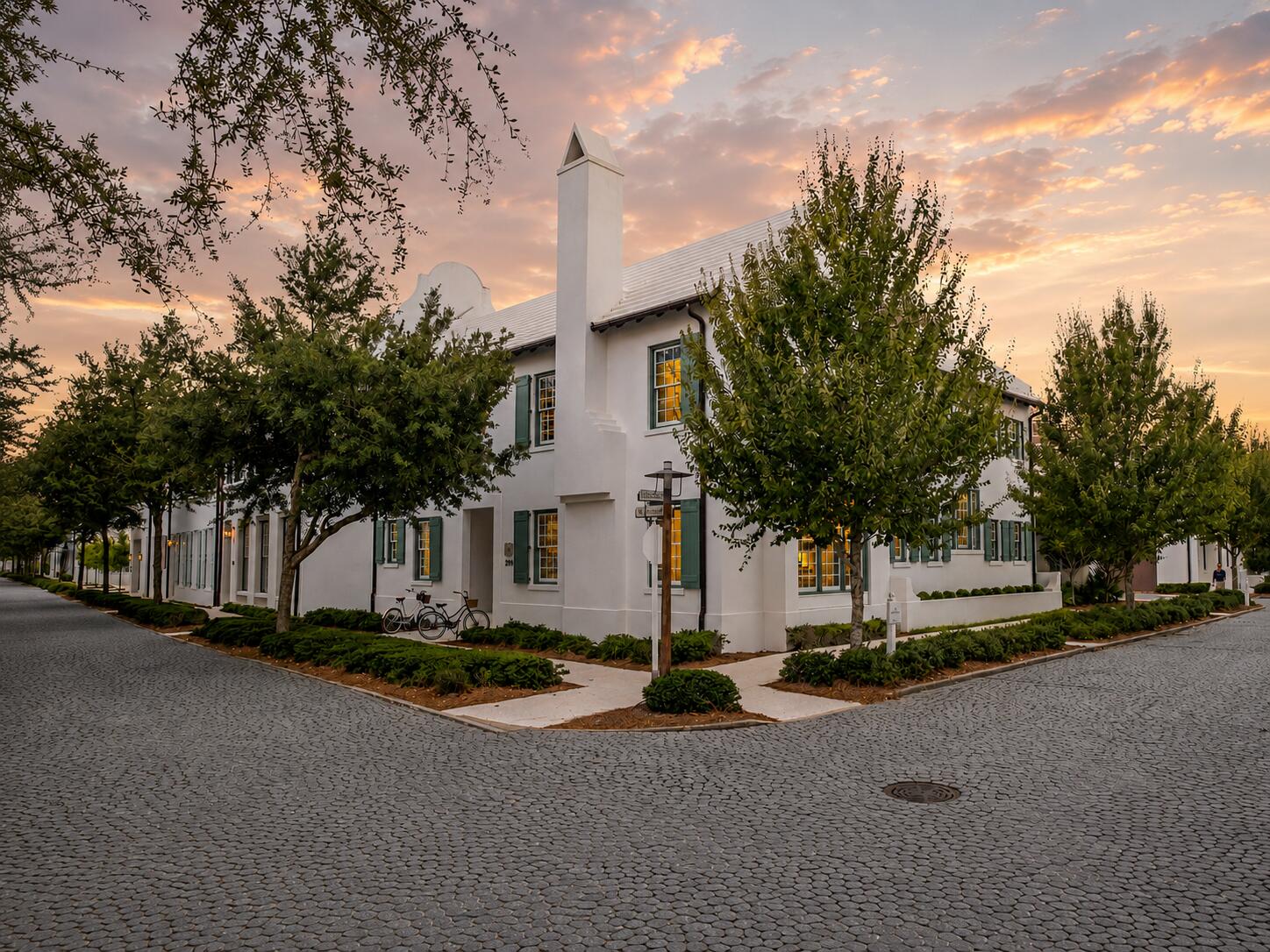 Designed by award-winning architect Jeremy Sommer, with interiors by acclaimed design firm Urban Grace Interiors, this residence blends architectural distinction, privacy, and effortless coastal living. Set on a premier corner at North Charles Street and South McGee Drive, the home offers abundant natural light, parkway views, and convenient access to the Gulf, Caliza Pool, ZUMA, Town Center, and The Silva.
A private courtyard with in-ground pool and covered loggia anchors the home, connecting indoor and outdoor spaces for easy everyday living and entertaining.

The main level includes a fireplace-anchored living room, chef's kitchen, two guest suites, an attached two-car garage, and an additional assigned parking space--an uncommon luxury in Alys Beach.

Upstairs, the primary suite is joined by an additional guest suite with flexible bonus room, and a secondary living space which opens to an expansive rooftop terrace with summer kitchen and fire pit.

With four bedrooms, five-and-a-half baths, generous indoor-outdoor living, rare parking, and architectural pedigree, this home captures the best of Alys Beach living.