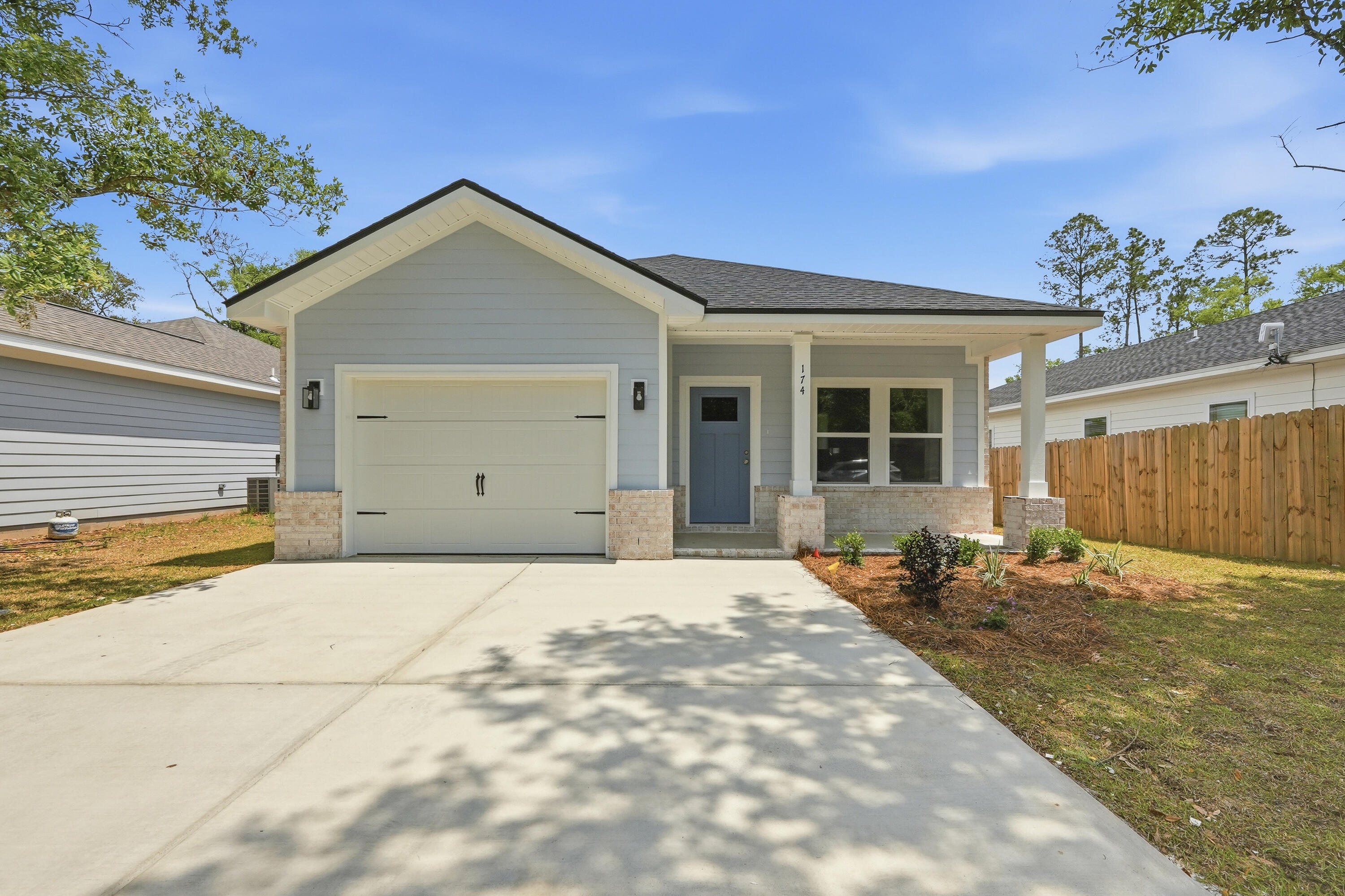 THIS CRAFTSMAN STYLE HOME WILL BE COMPLETED END OF AUGUST, the 'SCARLET' plan has vinyl plank flooring throughout, quartz countertops, kitchen work island w/bar seating, walk-in pantry, owner's bath has walk-in closet, double vanities, linen storage, shower only.  Open family/dining/kitchen area + finished garage.  Front & rear porches for relaxing, privacy fenced yard is fully landscaped with sprinkler system.   Seller will contribute up to $12,000 towards buyers closing costs (call for details). MUST CLOSE BY AUGUST 31, 2026.  Photos of similar sold home, elevation will vary, interior/exterior colors & finishes will vary.